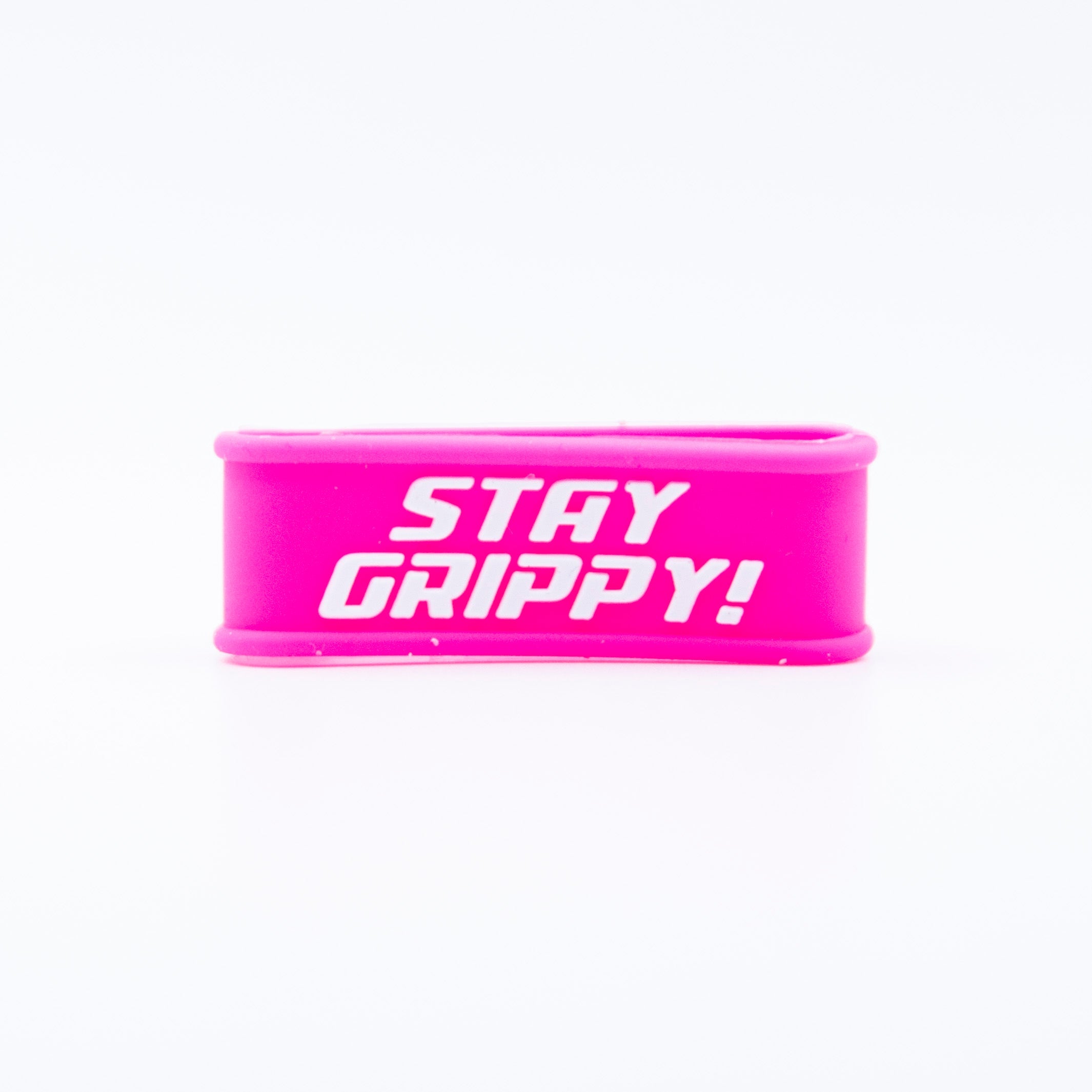 Pink rubber wristband with white "Stay Grippy!" text.