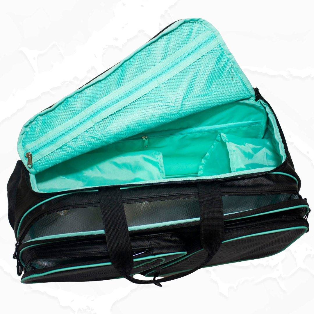 Black and teal duffle bag by Bodhi Pickleball, open to show its organized teal interior with mesh pockets.