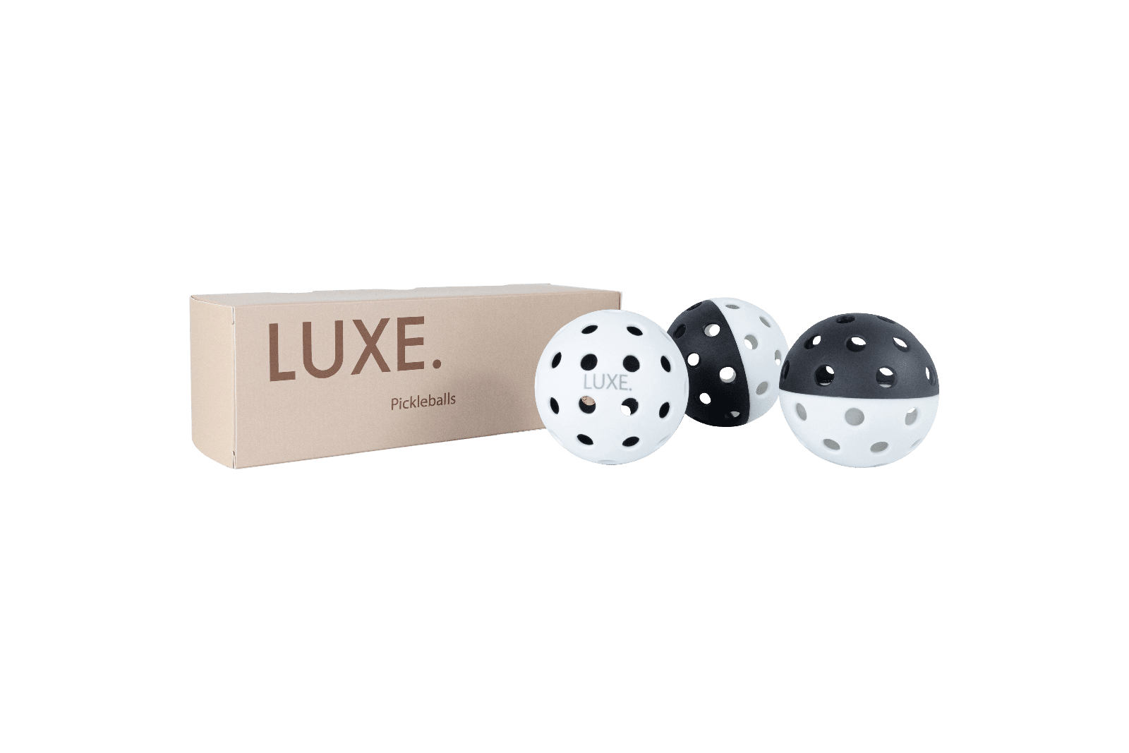 Box and pickleballs in white and black.