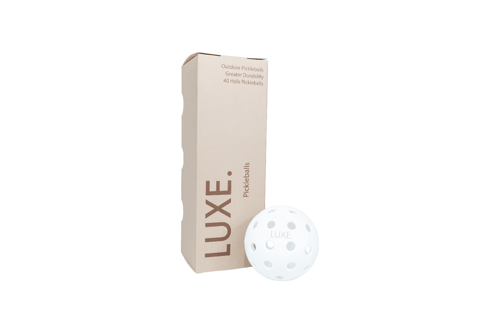 A box of Luxe pickleballs next to a white pickleball.