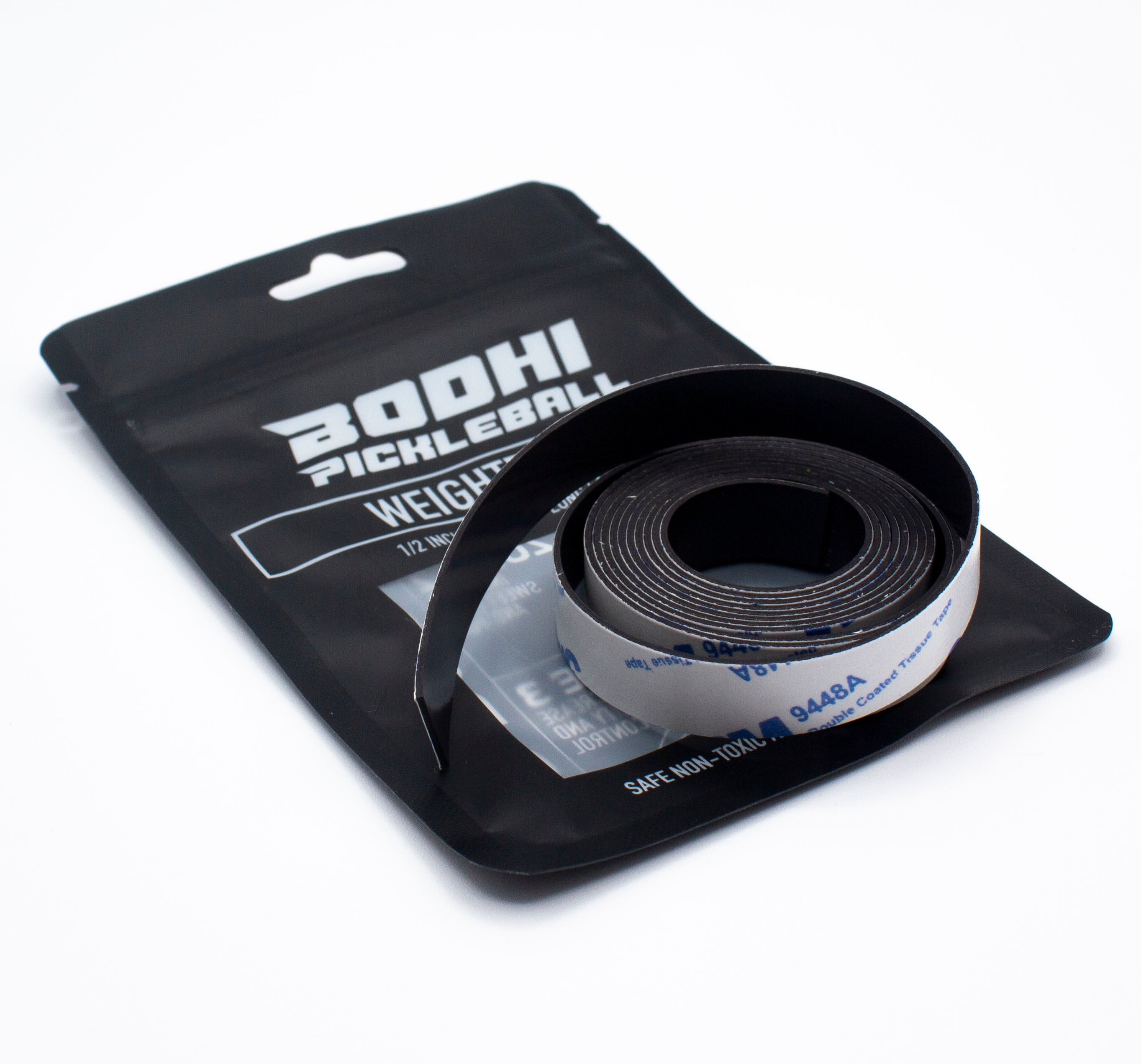 Black weighted tape by Bodhi Performance, rolled on a black pouch, revealing white backing.