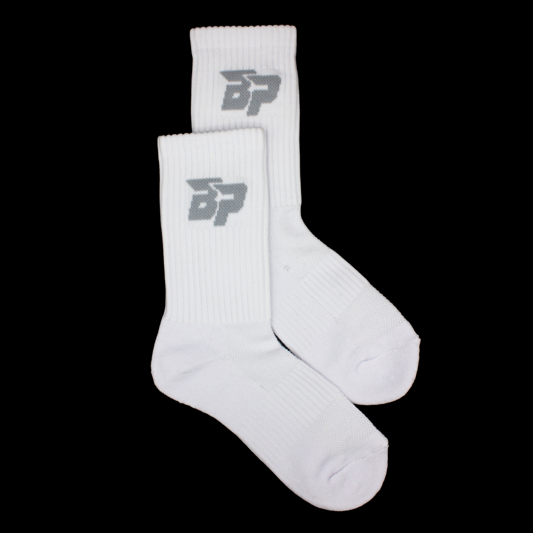 White performance socks by Bodhi Performance with a grey 'BP' logo on the calf.