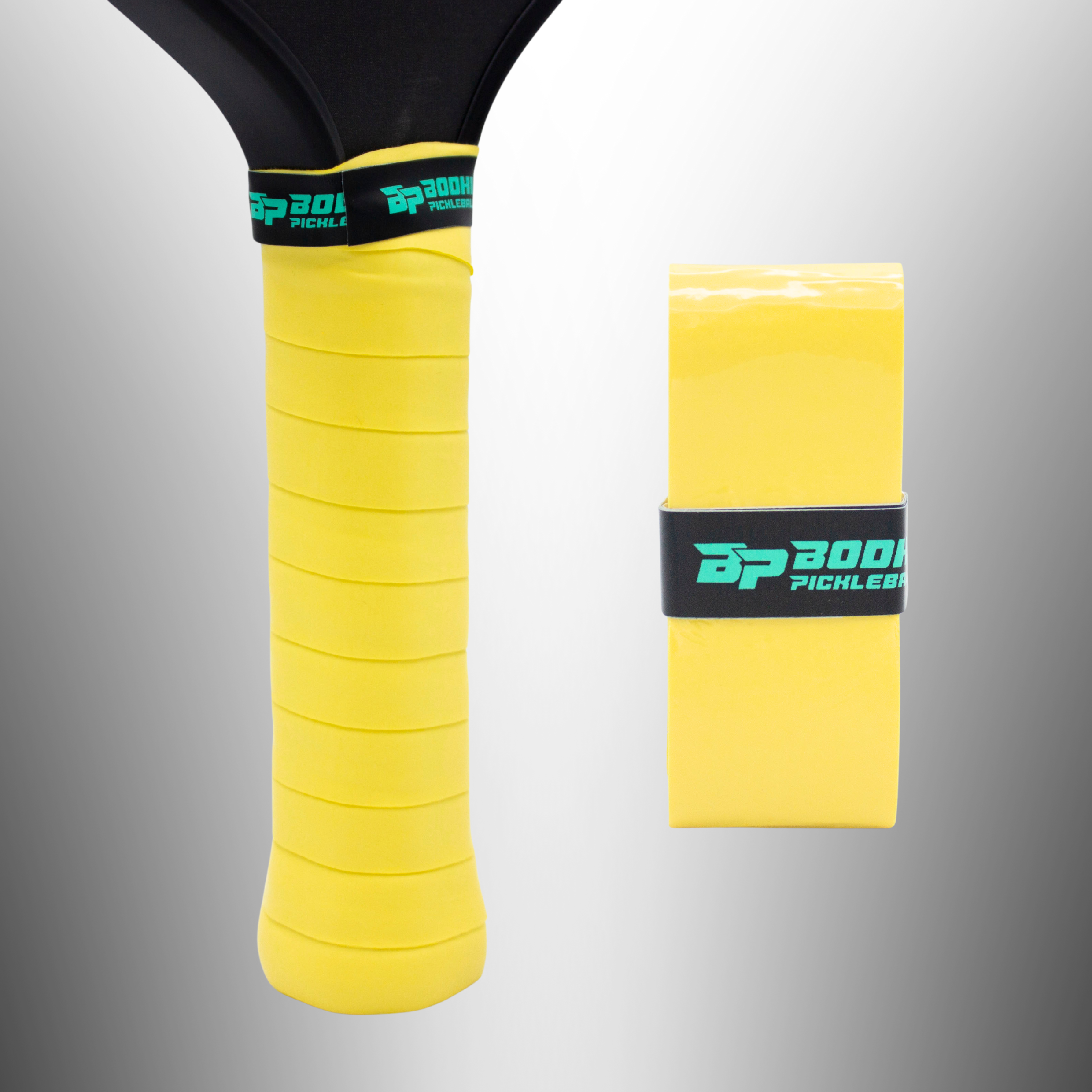 Yellow ridged pickleball paddle overgrip by Bodhi Pickleball, one wrapped on a paddle, one packaged.