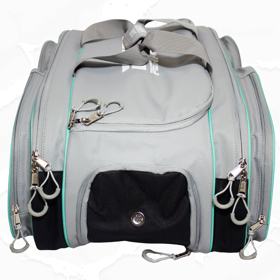 Gray and black duffle bag by Bodhi Pickleball with teal trim, multiple zippered compartments, and textured fabric.