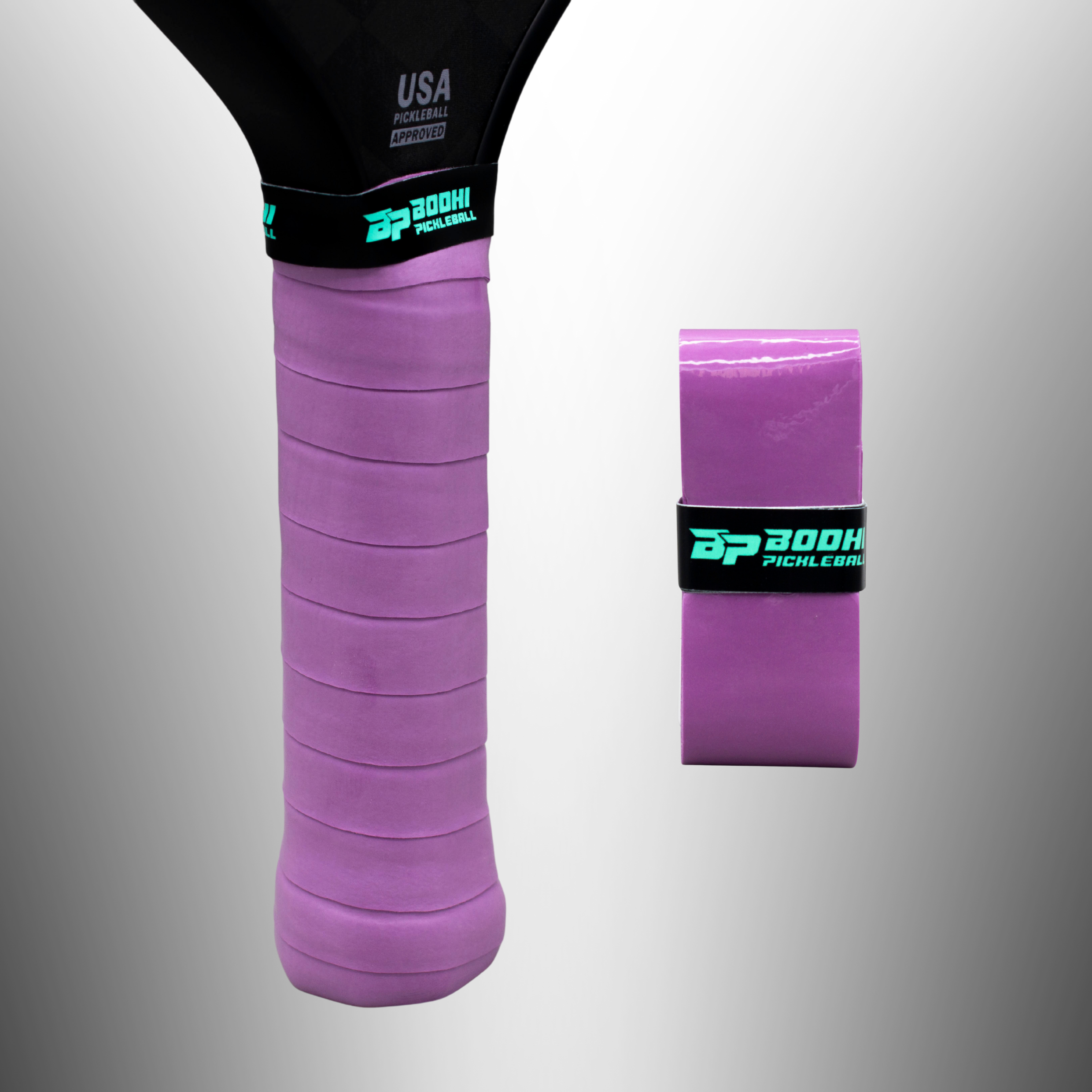 Textured purple PROtack Overgrips by Bodhi Pickleball, one wrapped on a black paddle handle with logo, another as a rolled new grip.
