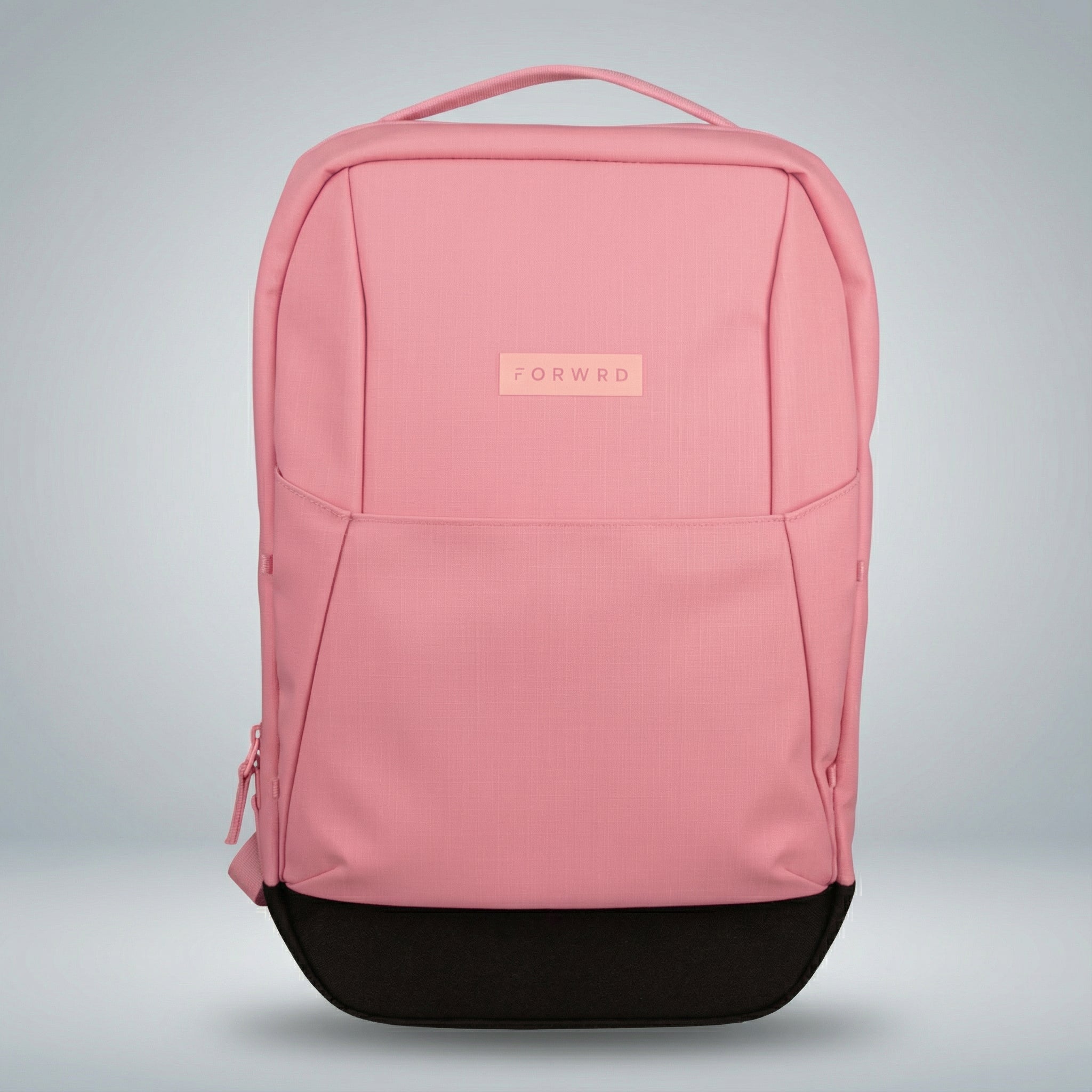 Pink fabric pickleball backpack by FORWRD, with a black bottom panel and a front zippered pocket.