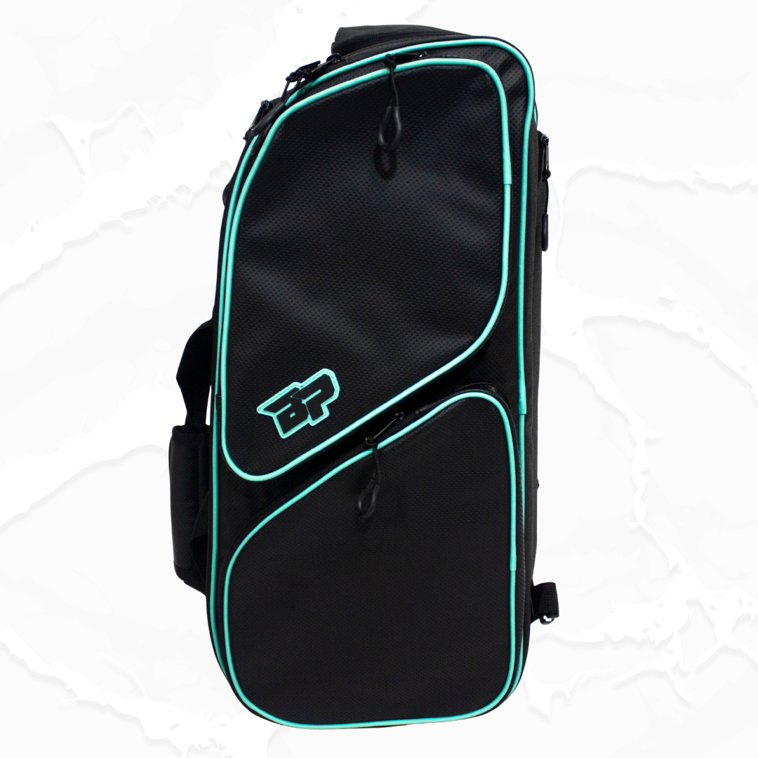 Black duffle bag with aqua accents by Bodhi Pickleball, featuring textured fabric, multiple zippered compartments, and a prominent 'BP' logo.