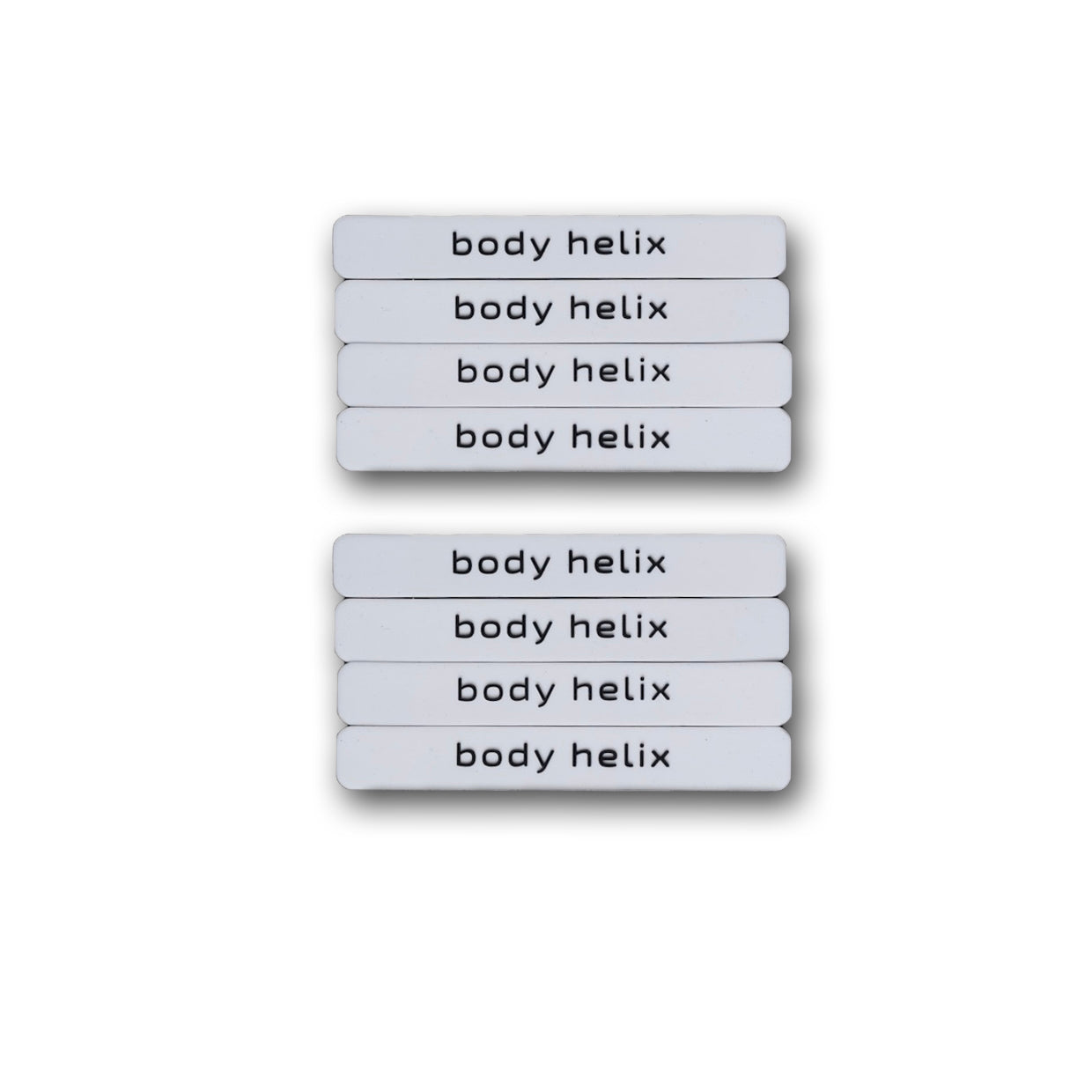 Eight white Body Helix labels stacked in two separate piles.