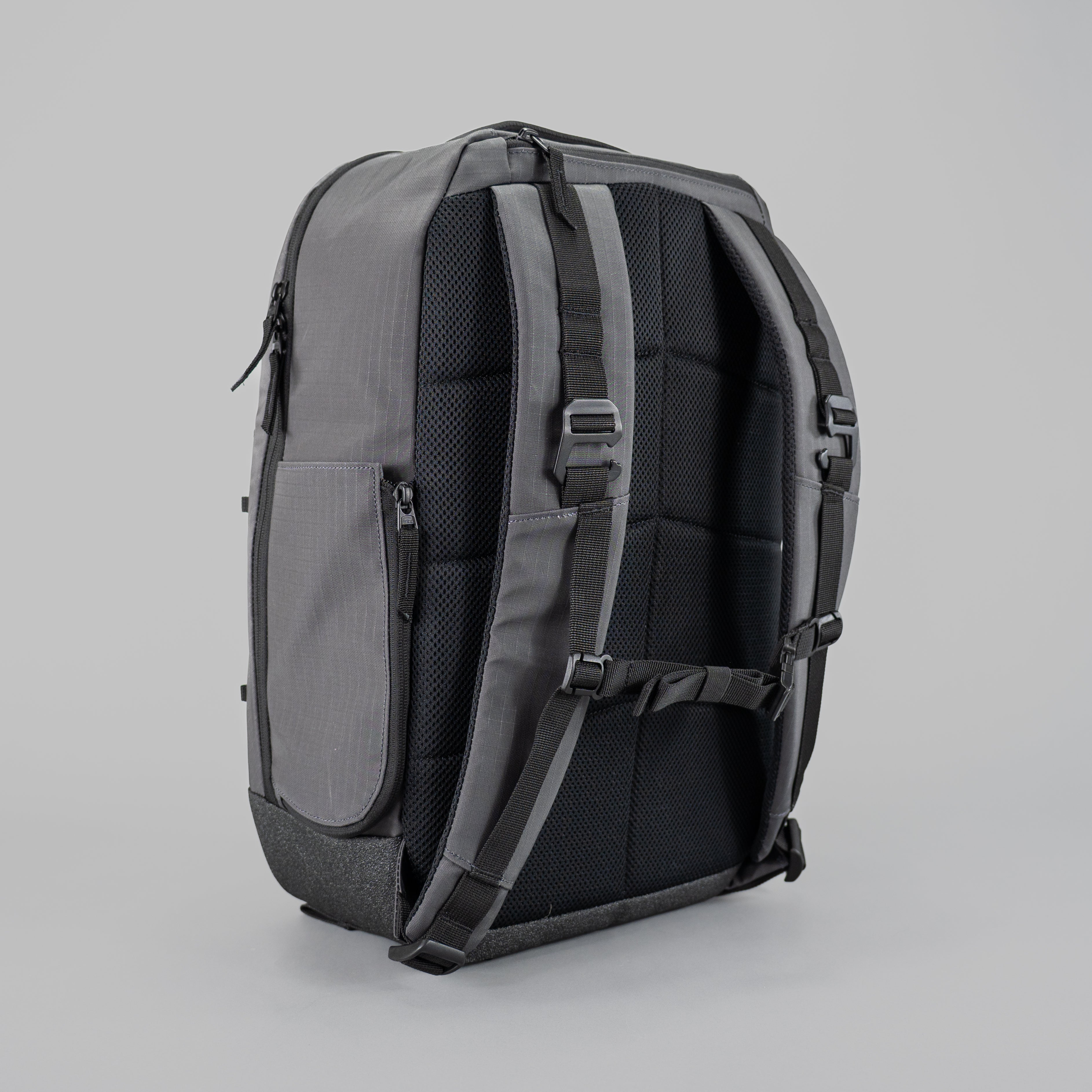 Gray backpack with black mesh backing.