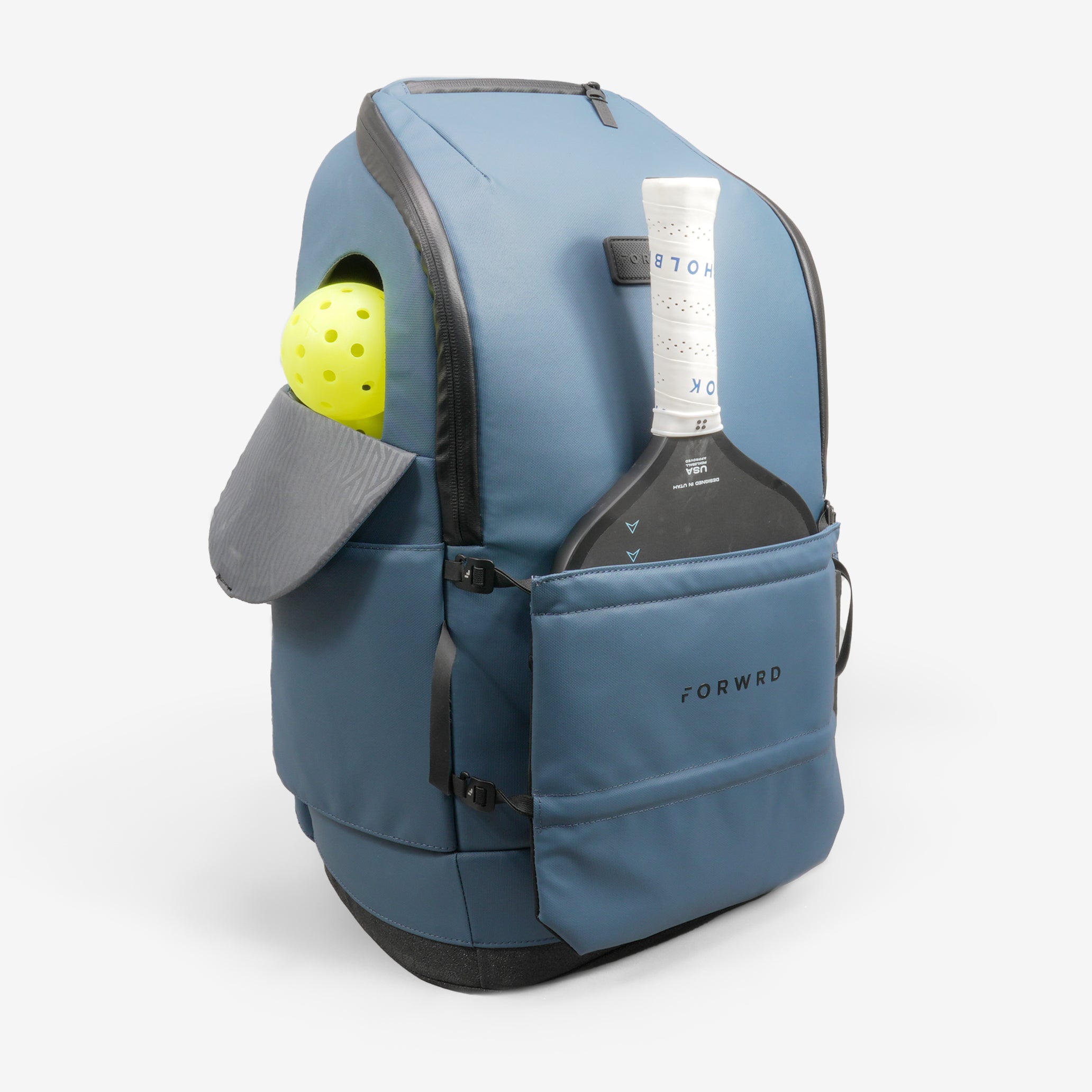 Blue-grey pickleball backpack by FORWRD, with a yellow pickleball and paddle in side pockets, and a front logo.