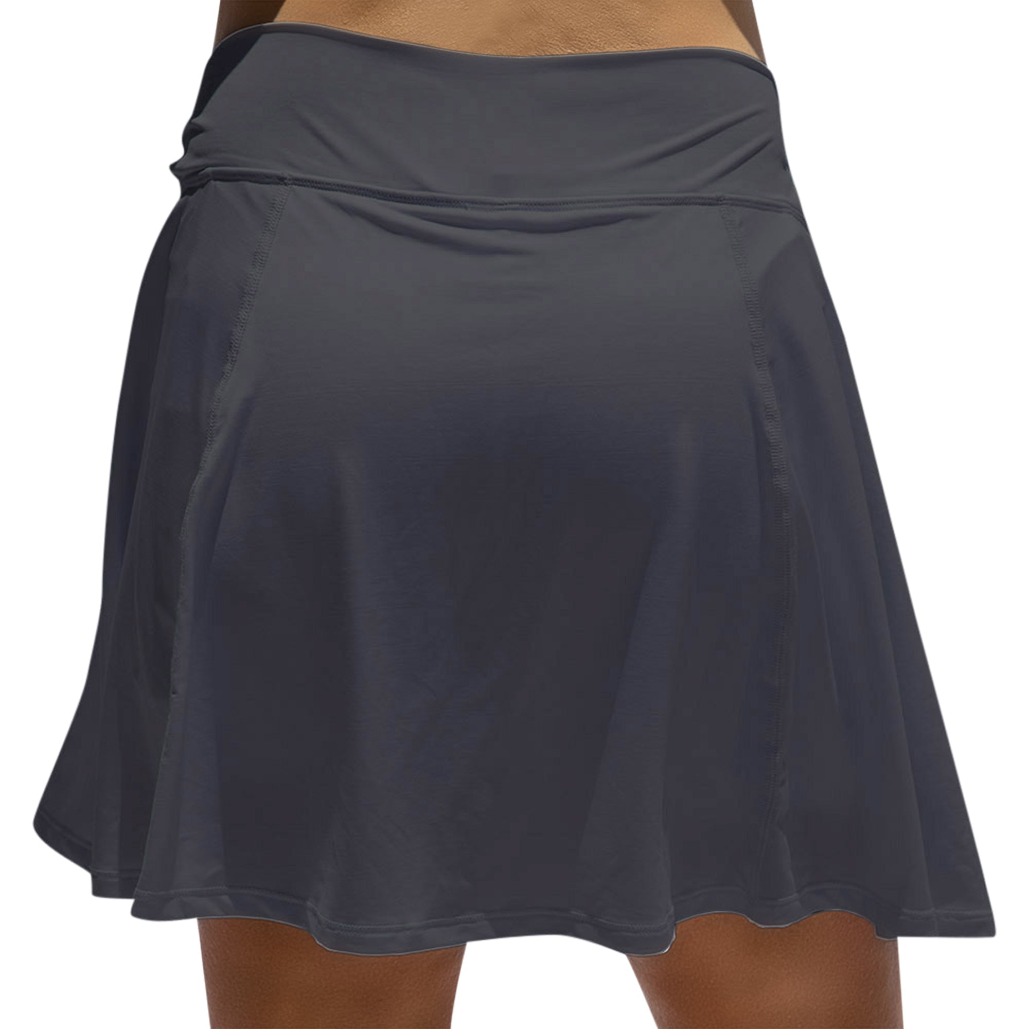 Black A-line skort by Pickleball Bella, featuring a wide waistband and flared hem, back view.