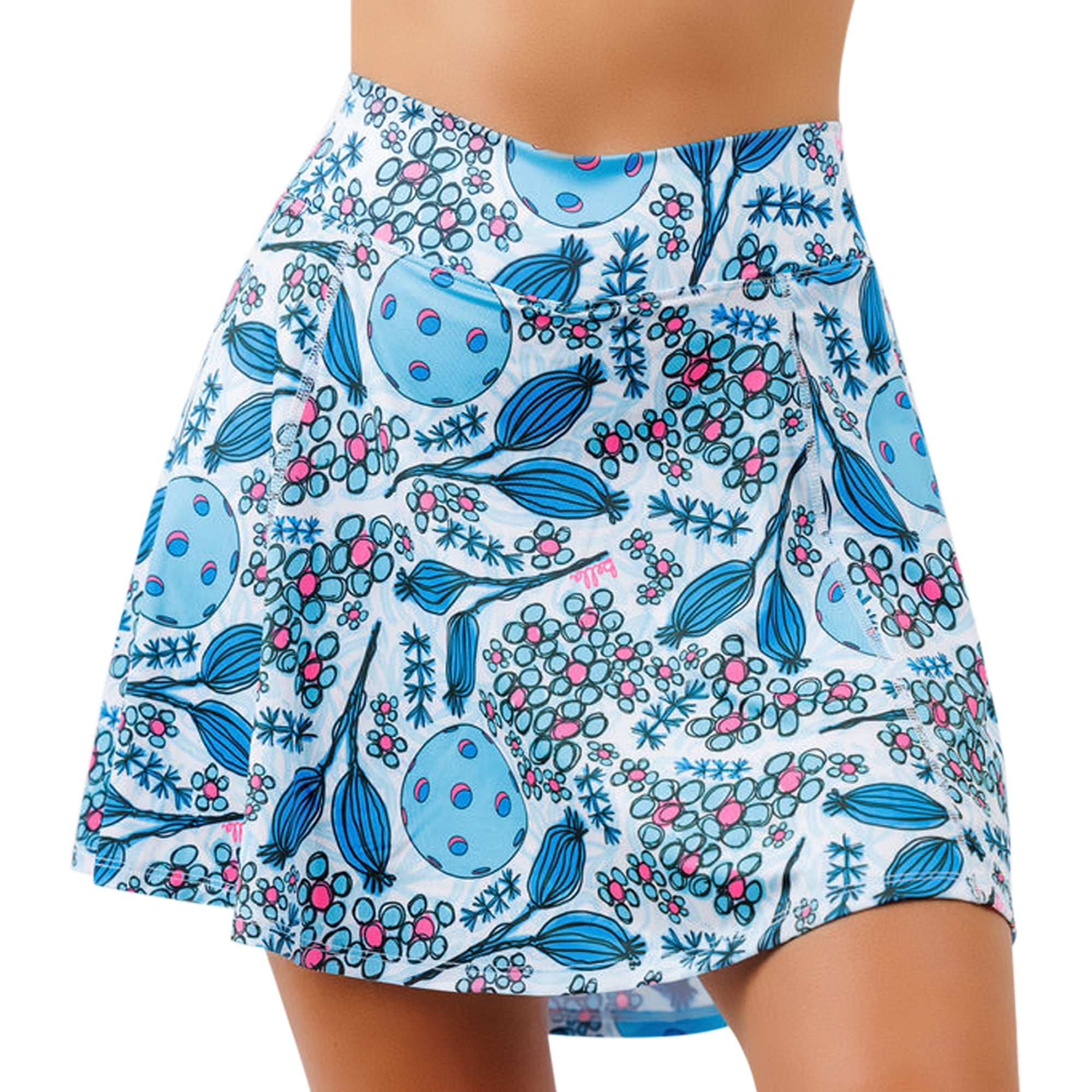 A-line skort with a blue, pink, and white patterned fabric by Pickleball Bella, featuring pickleball balls, flowers, and plant motifs.