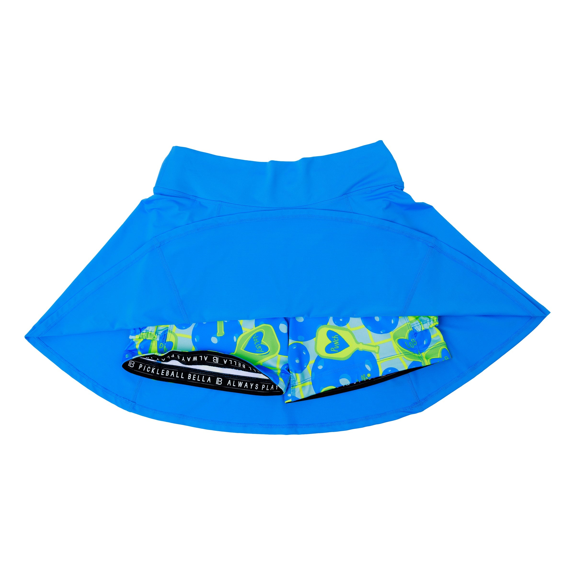 Electric blue A-line skort by Pickleball Bella, revealing attached shorts with blue and green pickleball paddle patterns and text.
