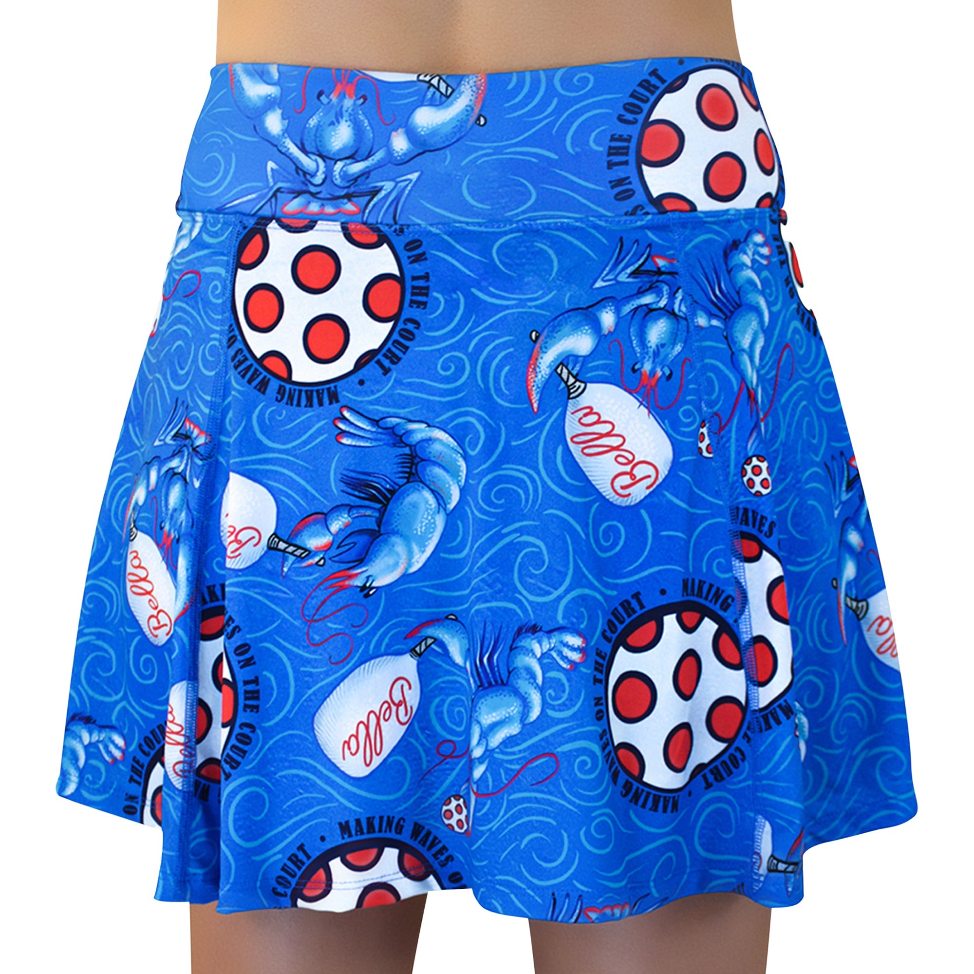 Blue A-line skort by Pickleball Bella, patterned with blue lobsters, white polka-dot pickleballs, and 'Bella' bottles.