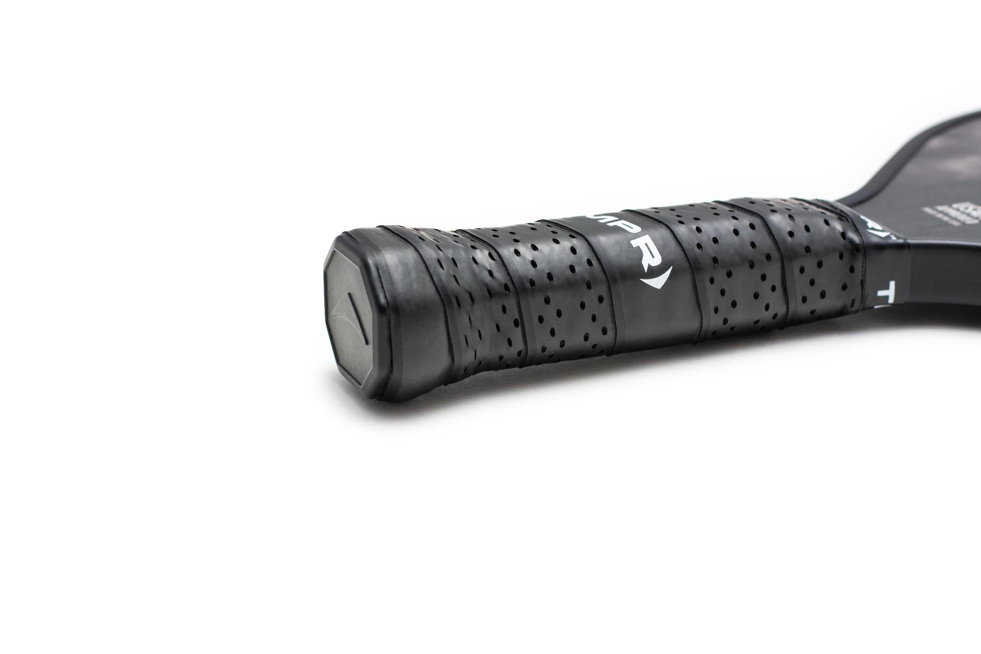 Black pickleball paddle handle by TMPR Sports with a perforated grip and white branding, cropped view.