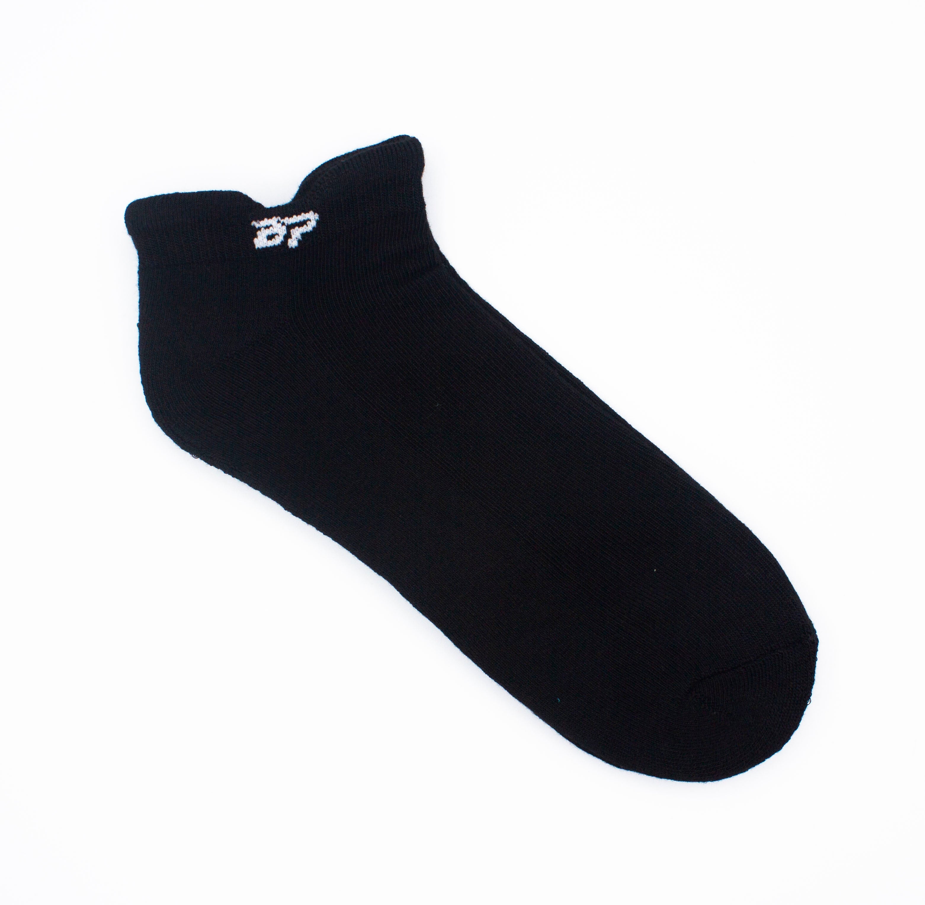 Black performance sock by Bodhi Performance with a white 'BP' logo on the ankle cuff.