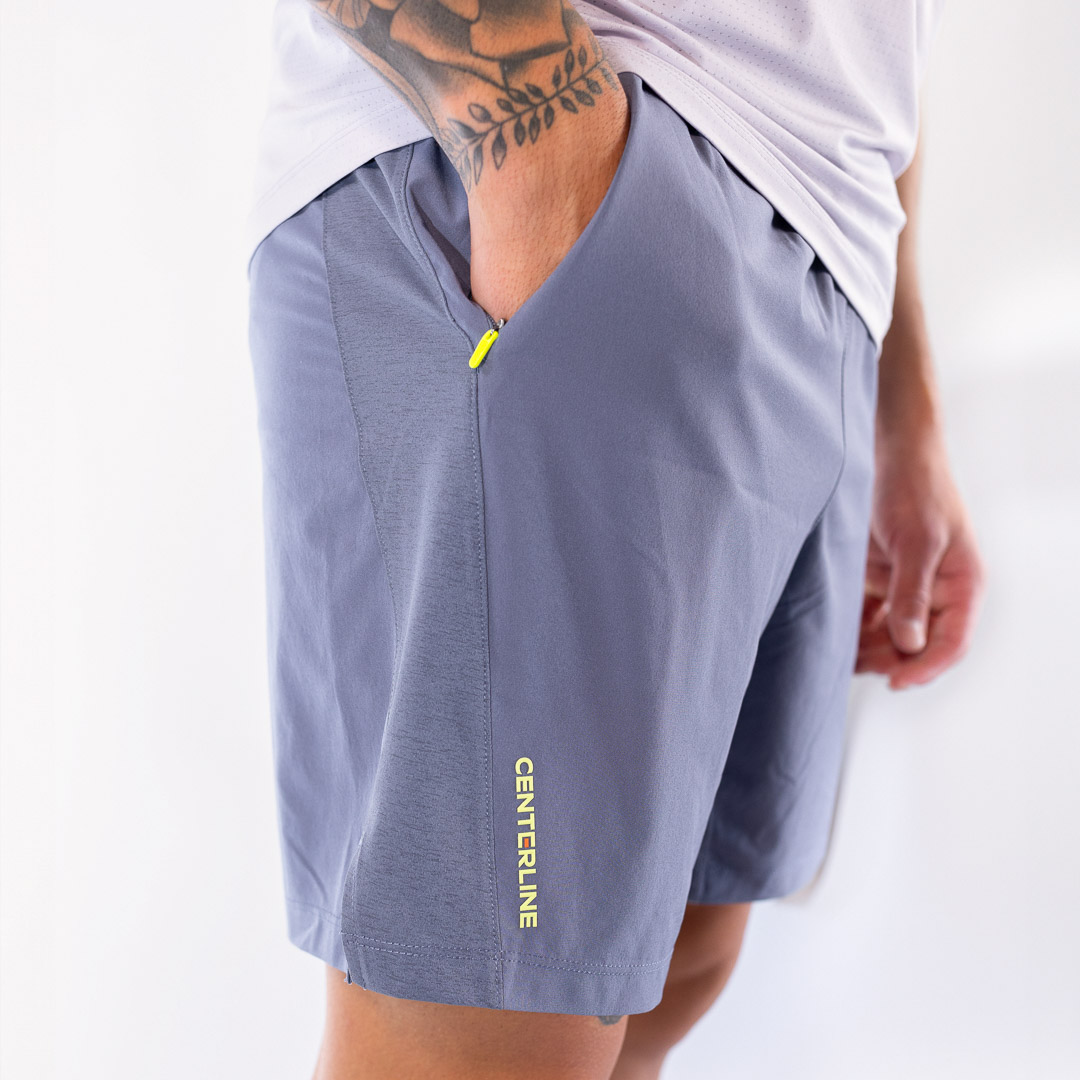 Gray shorts with neon accents.