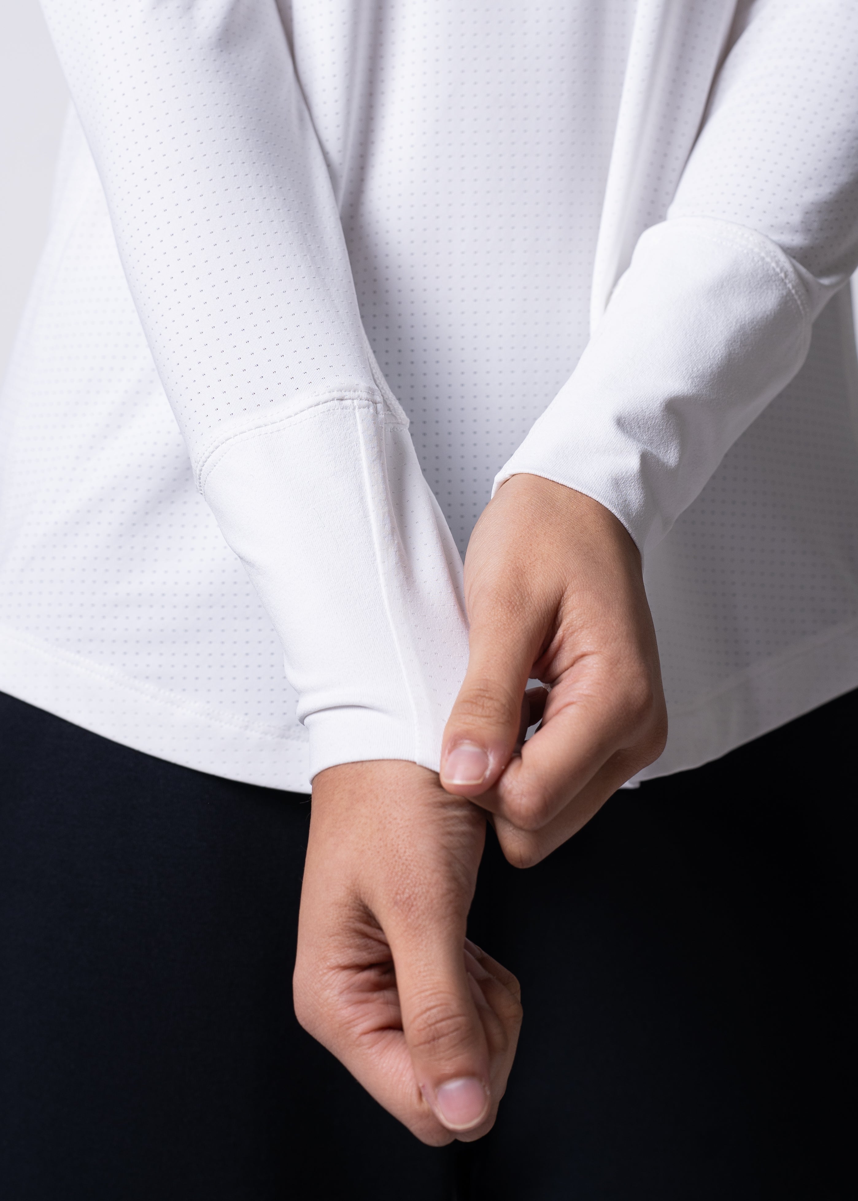 White long sleeve athletic shirt.