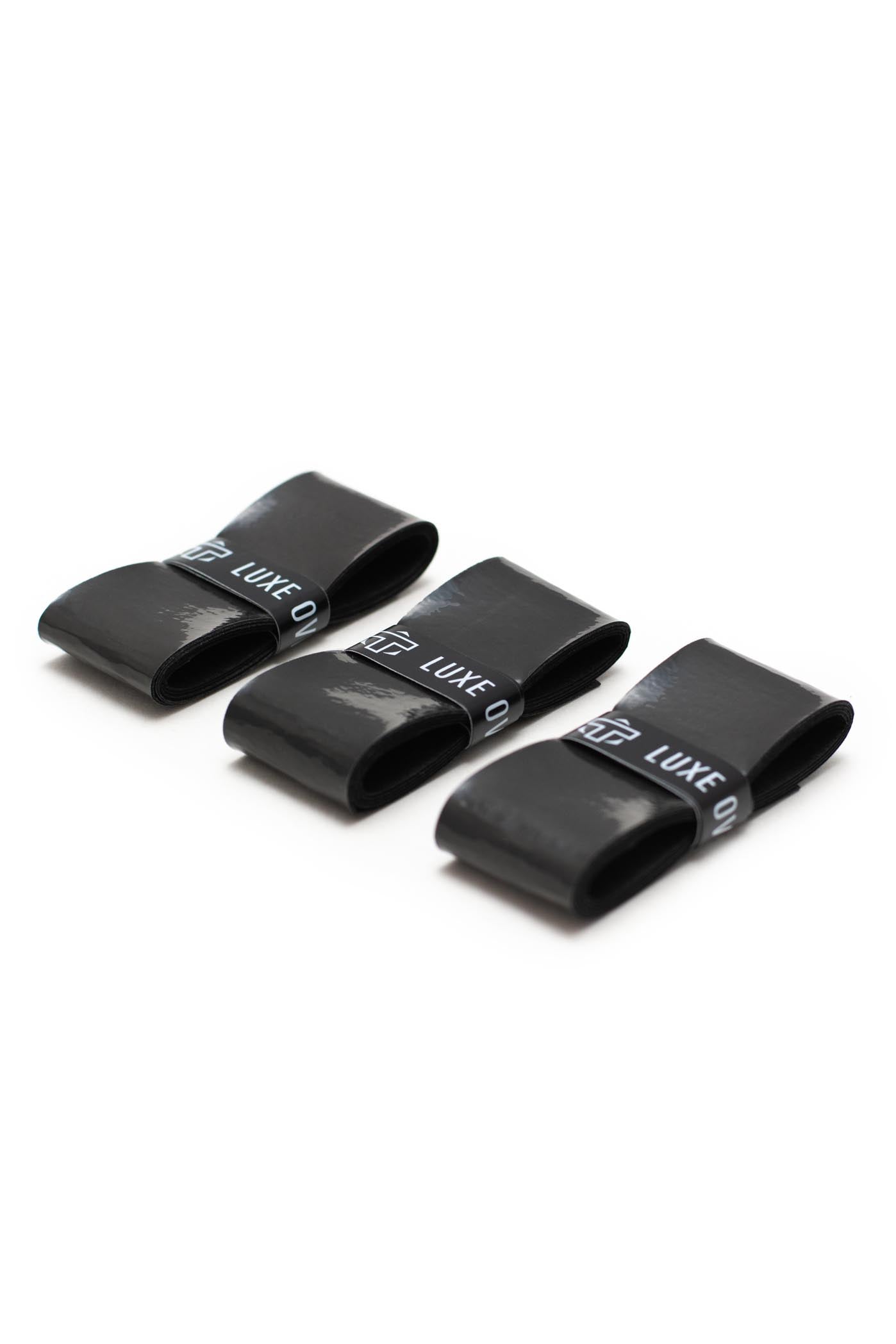 Black overgrip by TMPR Sports, shown as three neatly rolled pieces with logo bands on a white background.