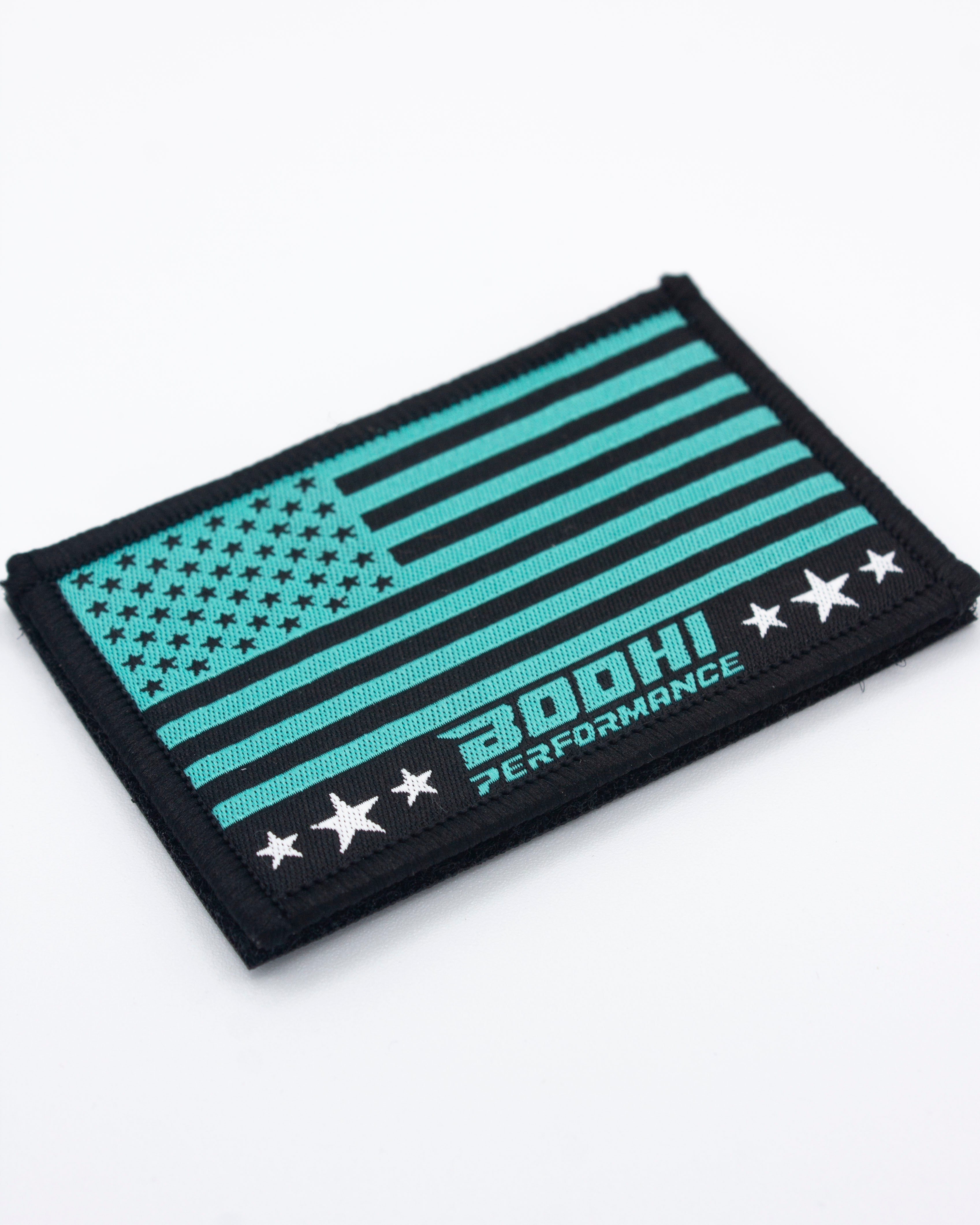 Black Velcro patches by Bodhi Performance, with teal and black American flag design, white stars, and 'BODHI PERFORMANCE' text.
