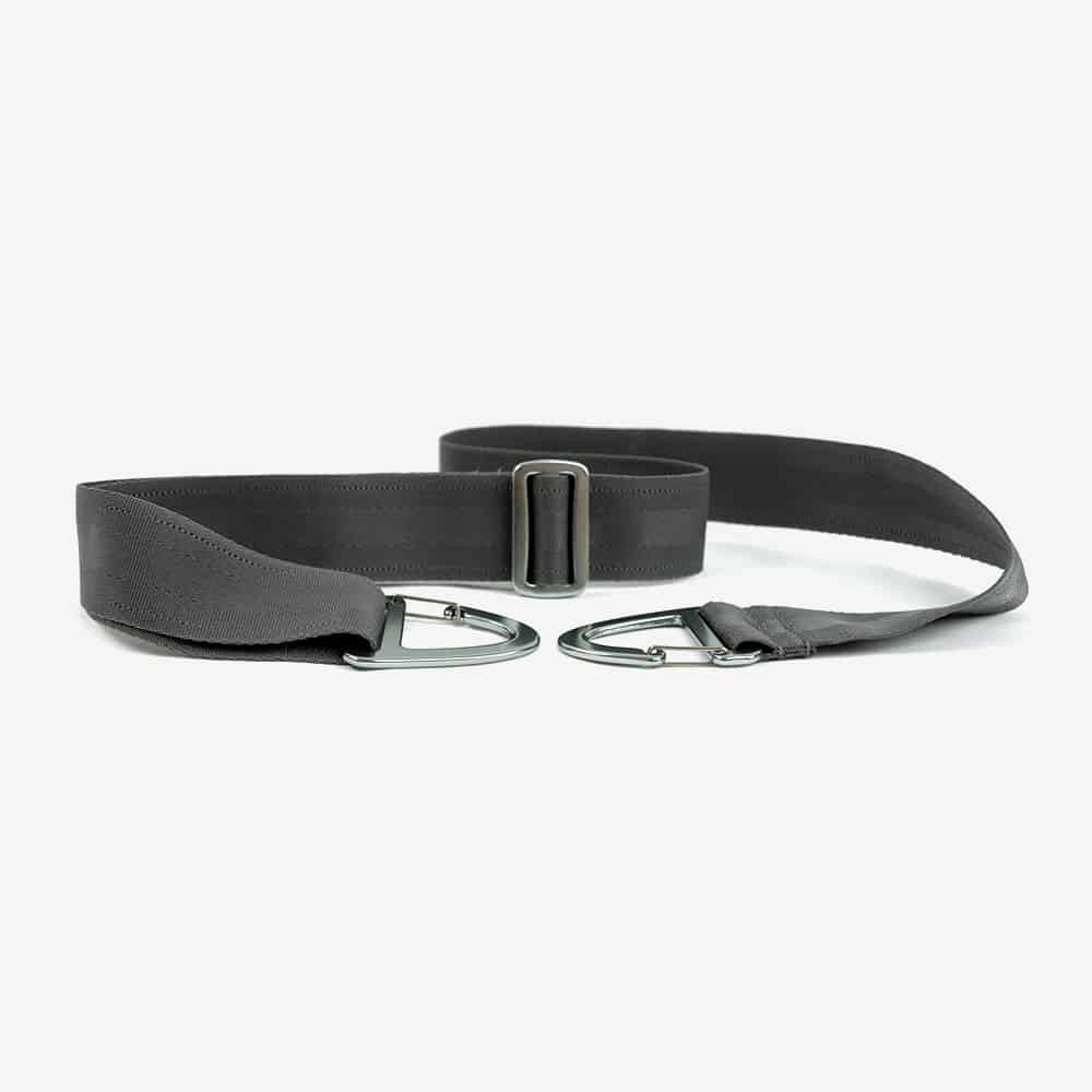 Gray yoga belt with metal buckles and a slider.