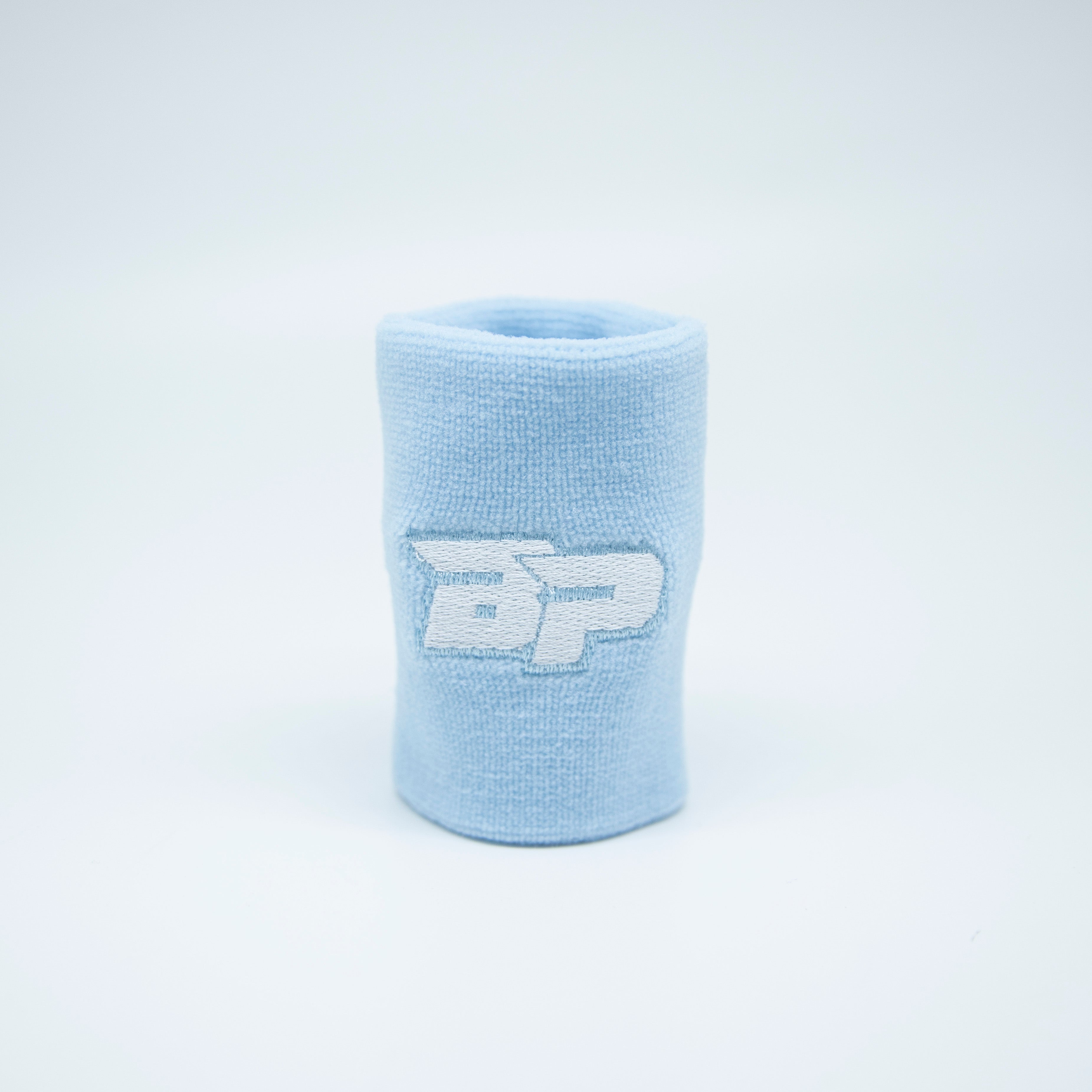 Light blue terry cloth wristband with white logo.