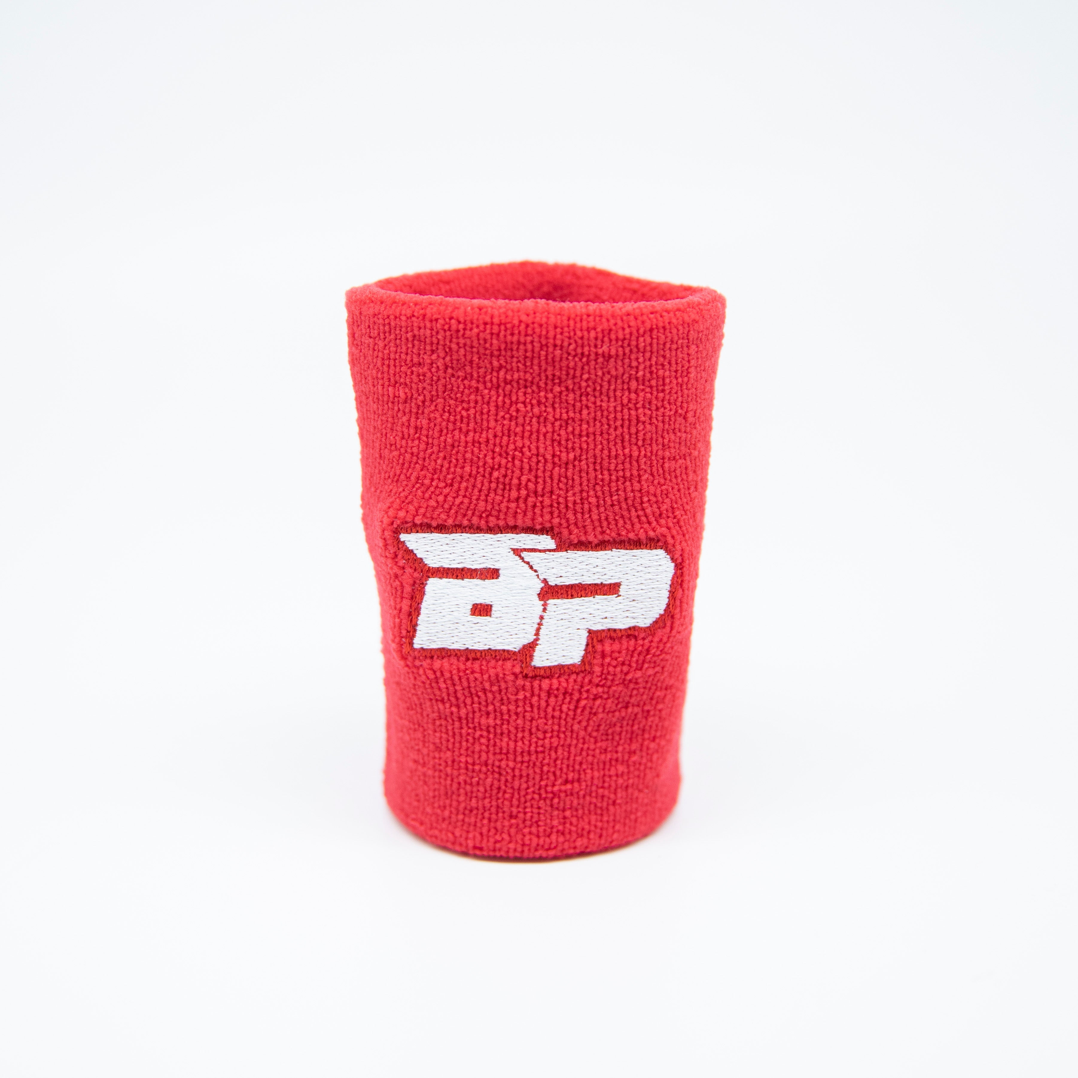 Red terry cloth wristband with white logo.