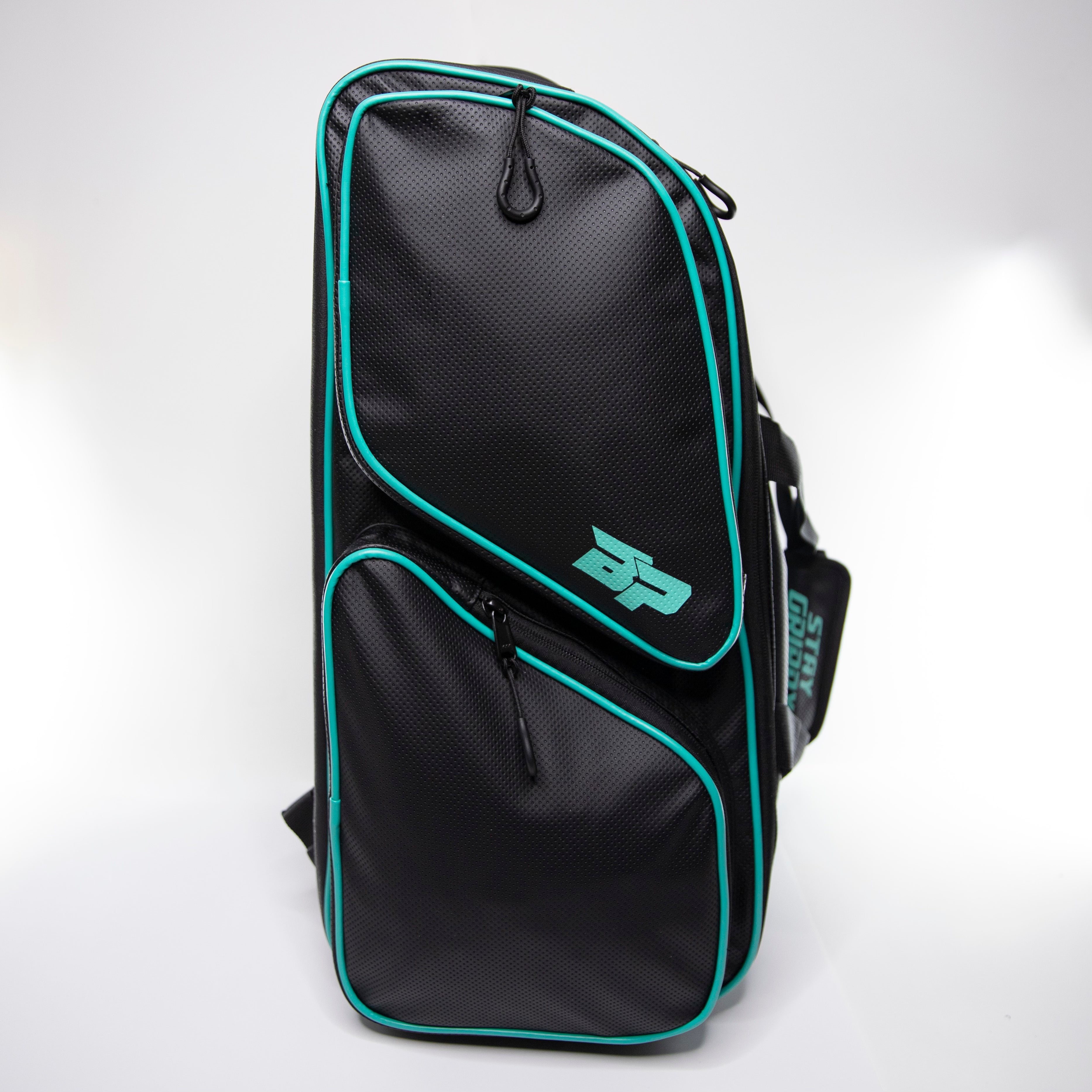 Black textured backpack with turquoise trim.