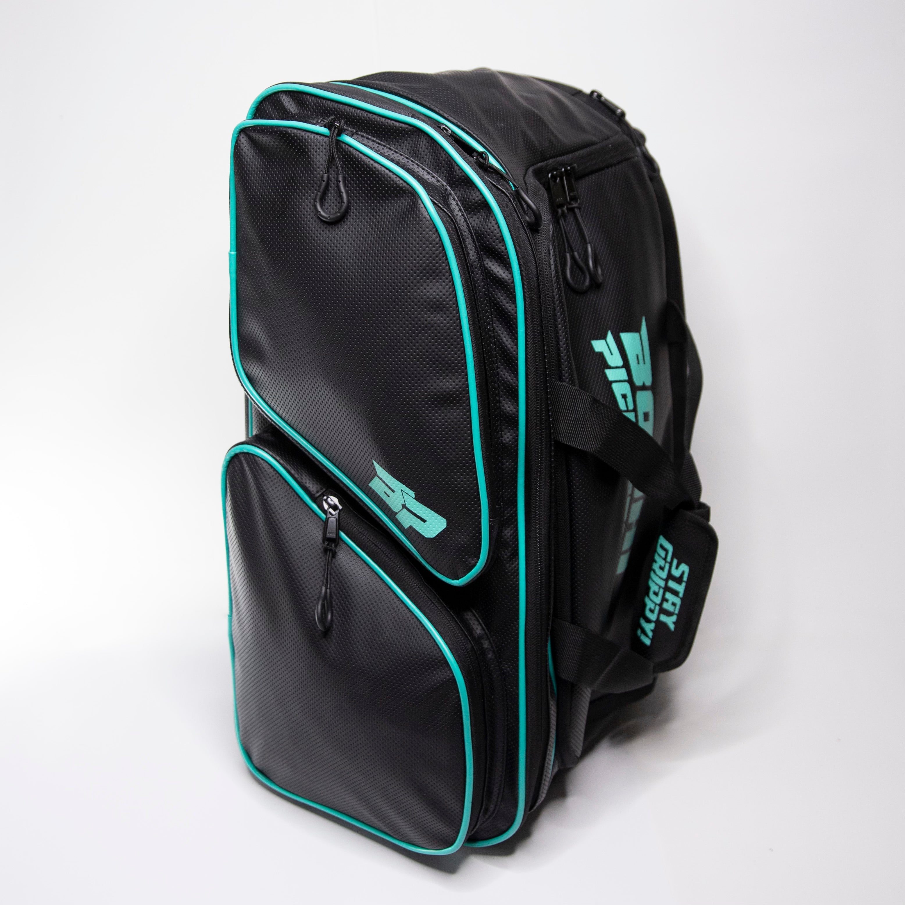 Black and teal bag with multiple compartments.