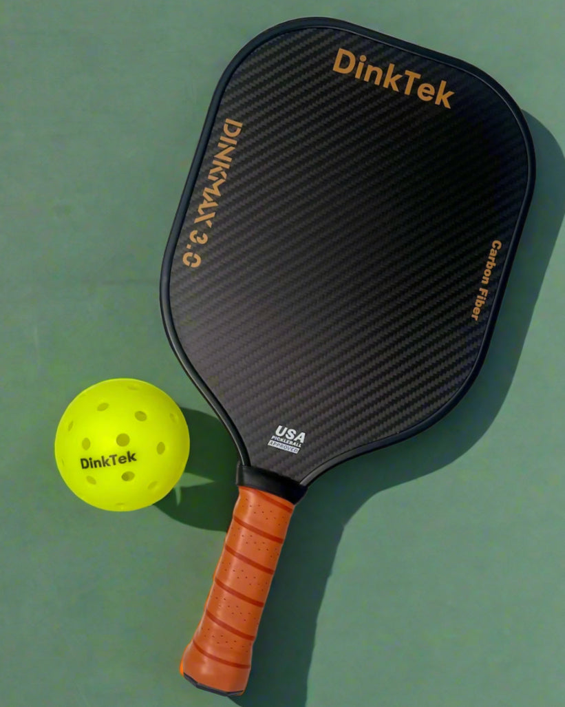 Pickleball paddle and ball with DinkTek branding on a green background.