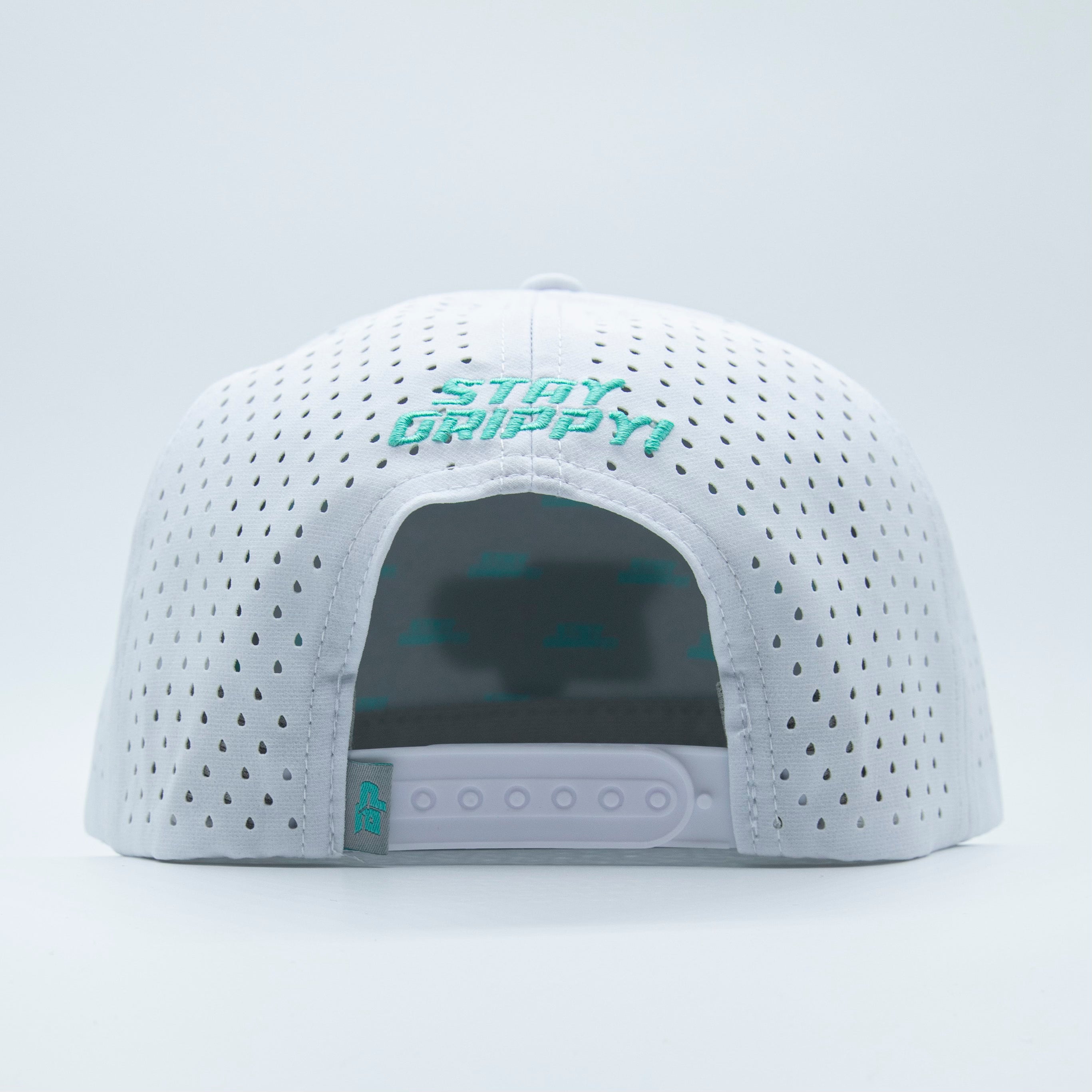 Back of light gray ventilated hat with turquoise embroidery.