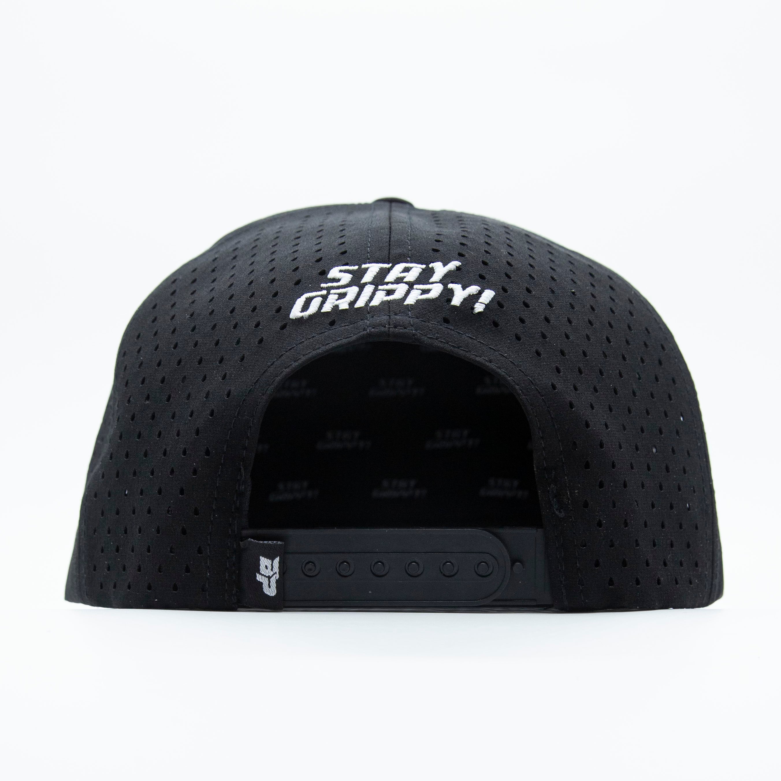 Back of a black perforated baseball cap with white text.