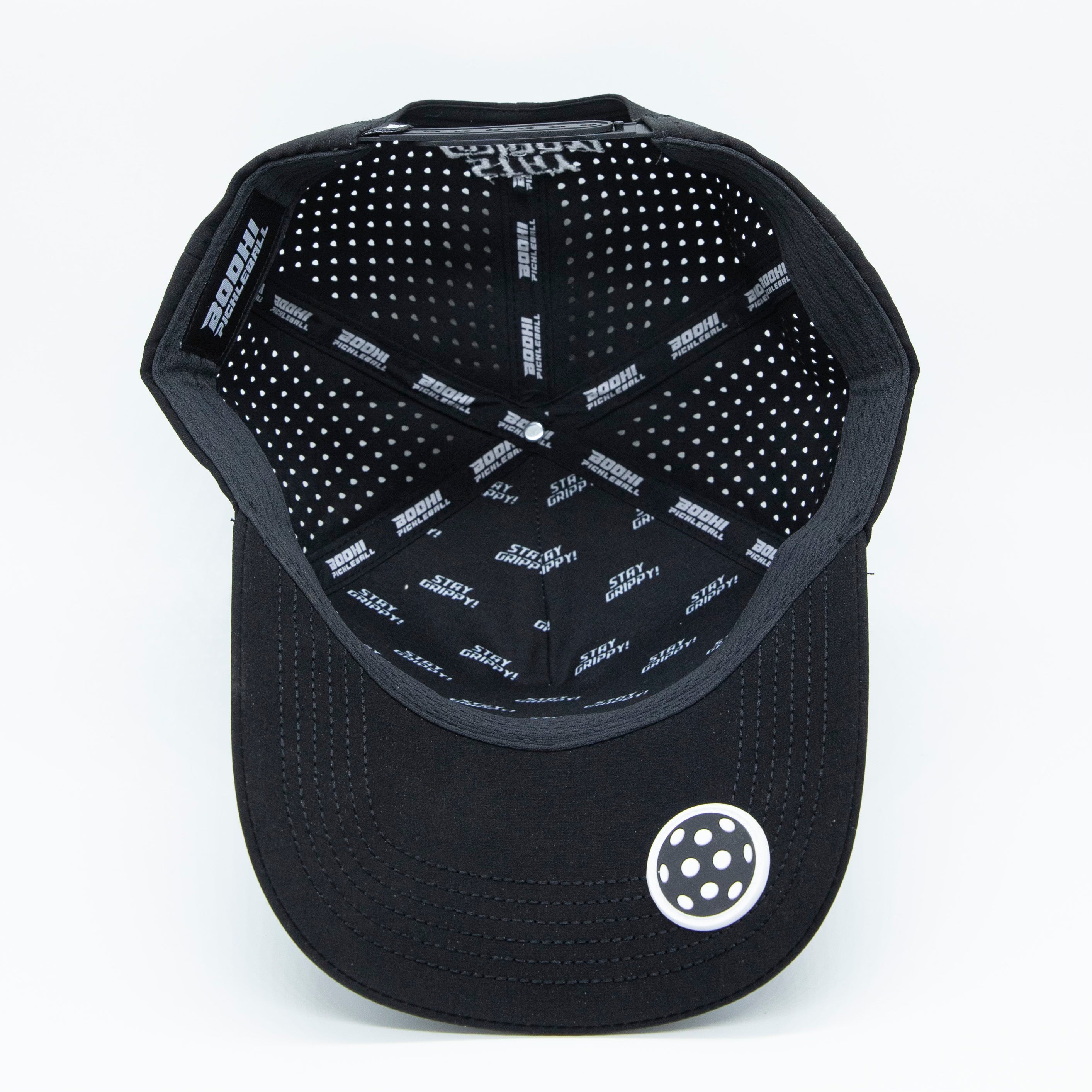 Black baseball cap, inside view, "BOOHI PICKLEBALL" branding, perforated interior.