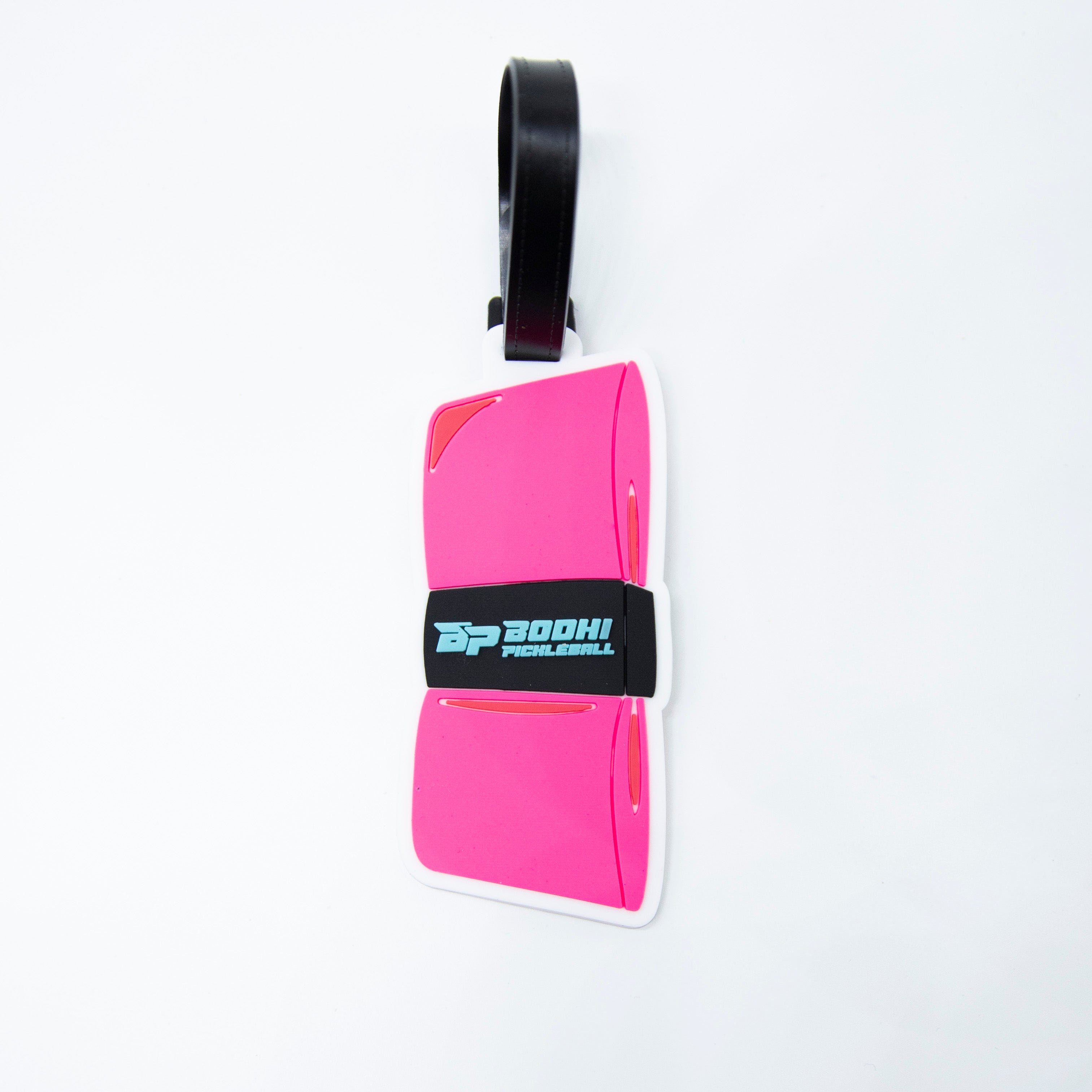 Pink and white pickleball paddle luggage tag with black strap.