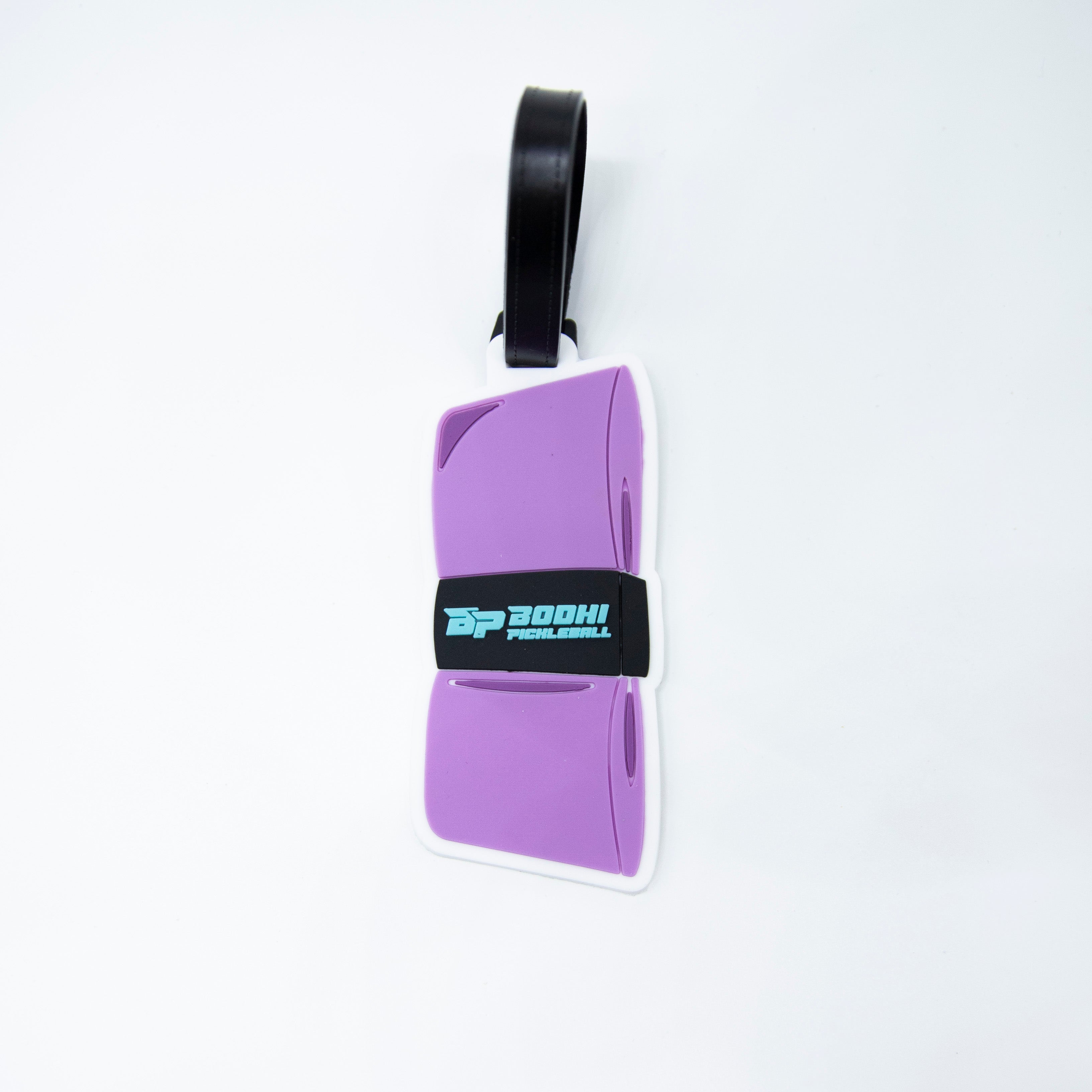 Purple luggage tag with a black loop and Bodhi Pickleball logo.