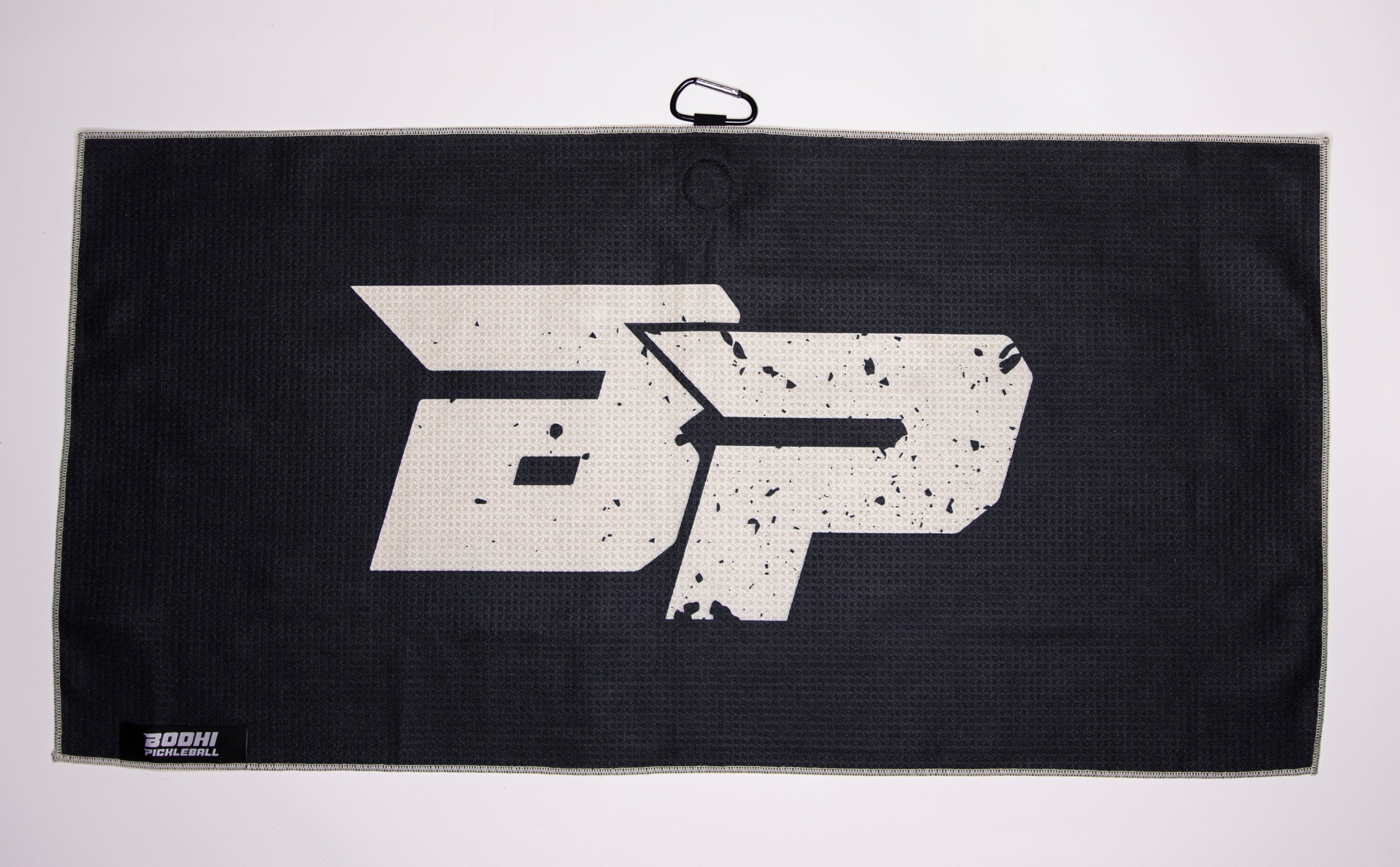 Black pickleball towel with a white "BP" logo and a carabiner clip.