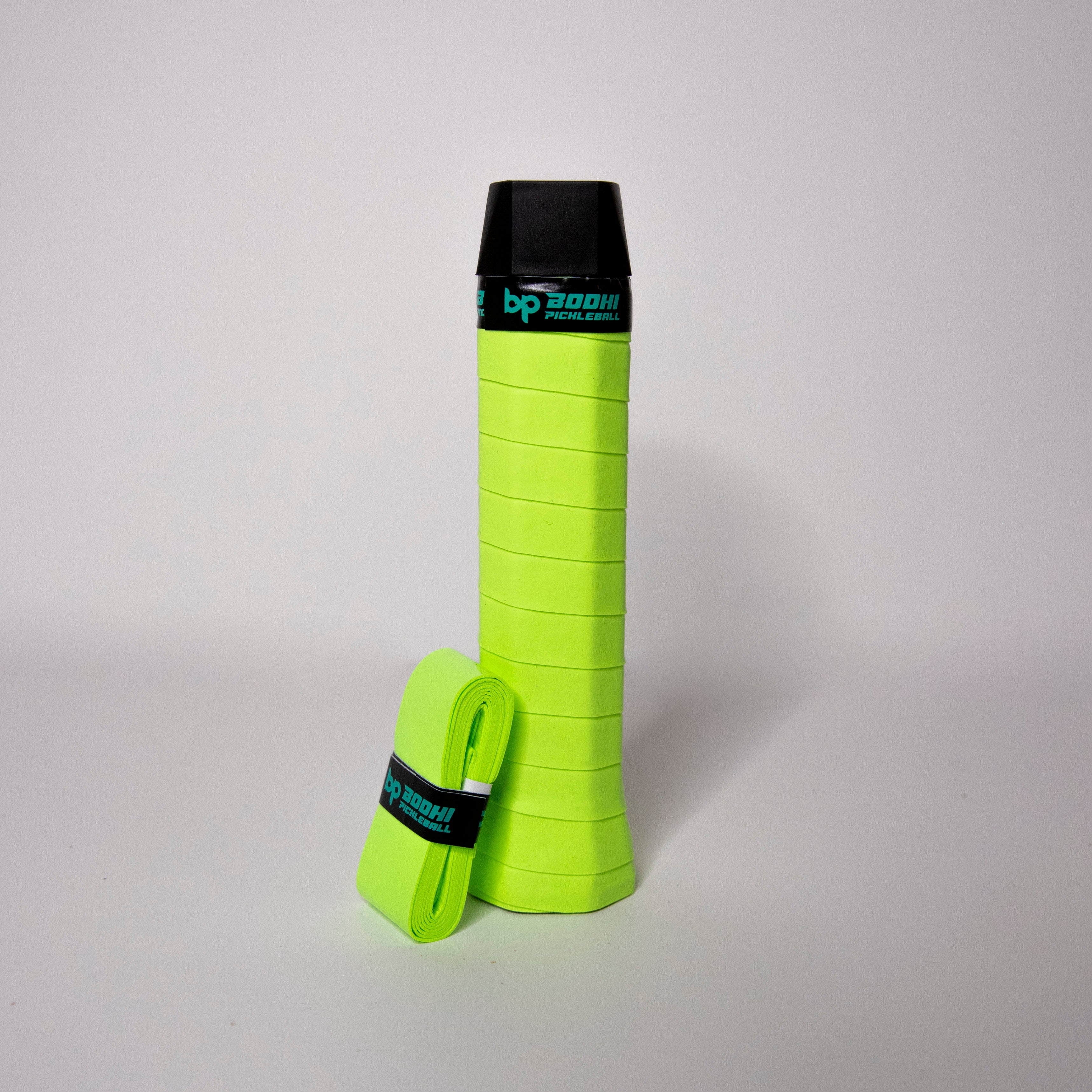 Neon green pickleball grip and wrap on a white background.