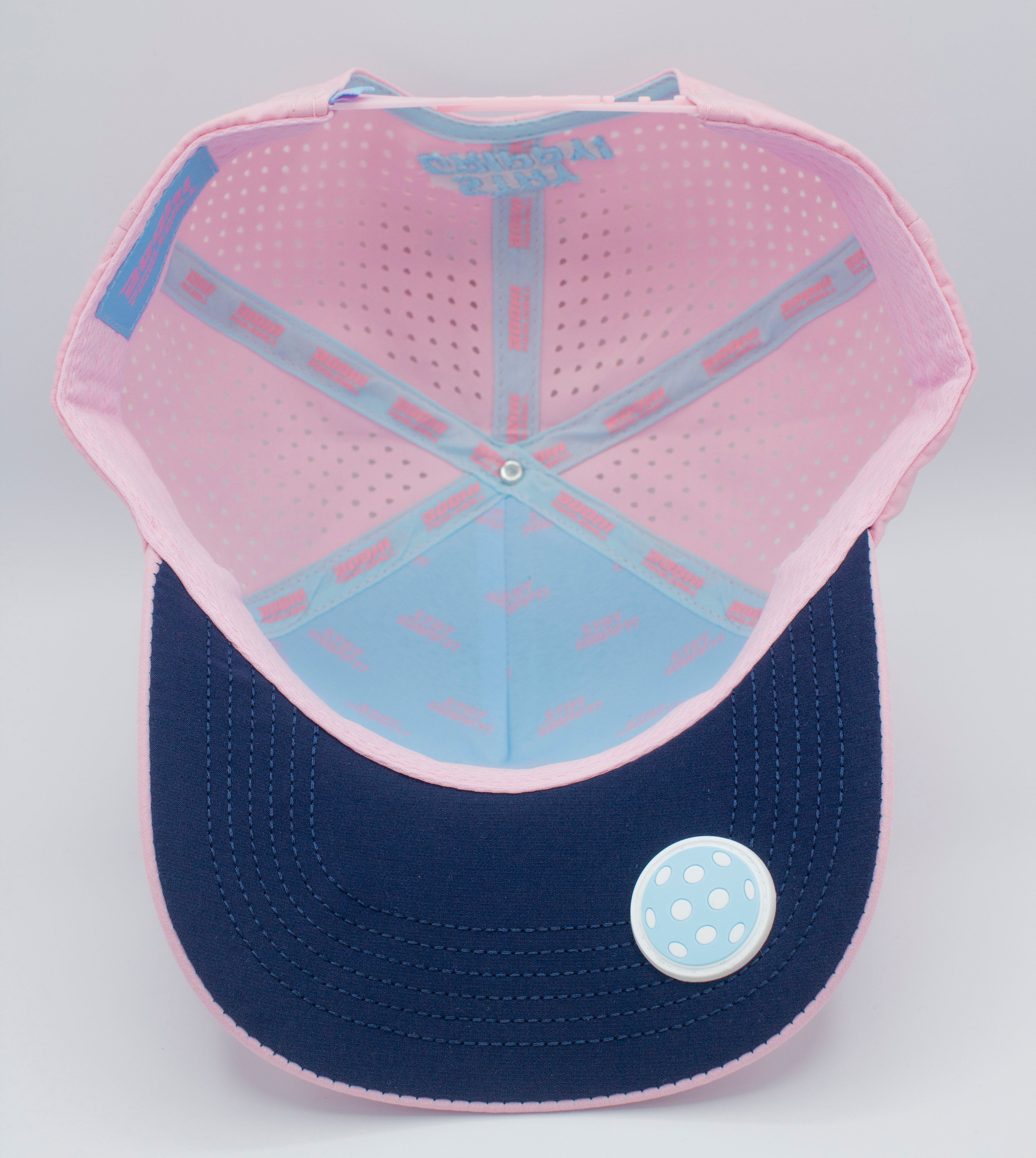 Pink and blue sports cap, view from inside.