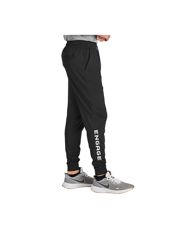 Black Men's Valor Warmup Pants by EngagePickleball, with "ENGAGE" printed vertically on the lower left leg, shown from the side.