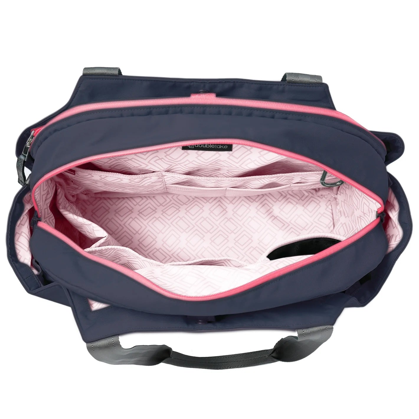 A dark blue tennis duffel and tote bag by Doubletake, shown open from above with pink geometric-patterned lining and multiple interior pockets.