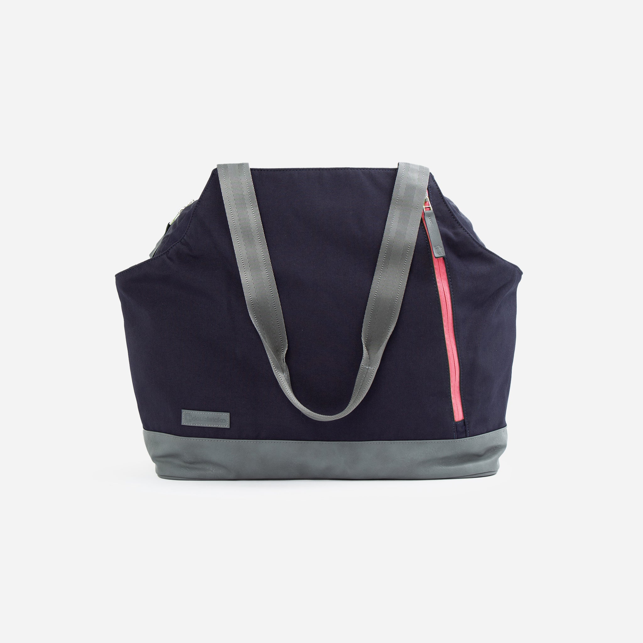 Dark navy Pickleball duffel and tote bag by Doubletake with a grey bottom, grey webbing handles, and a bright pink side zipper.