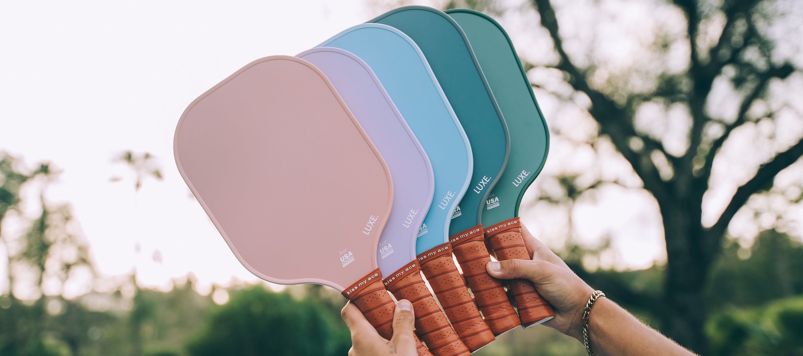 5 Luxe Pickleball paddles in pastel colors