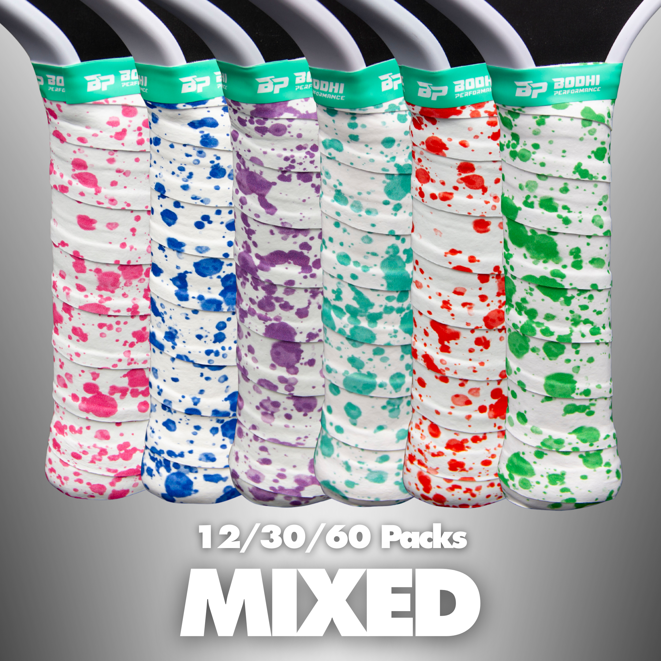 Six custom paddle overgrips by Bodhi Performance, white with colorful splatter patterns and green logo bands.