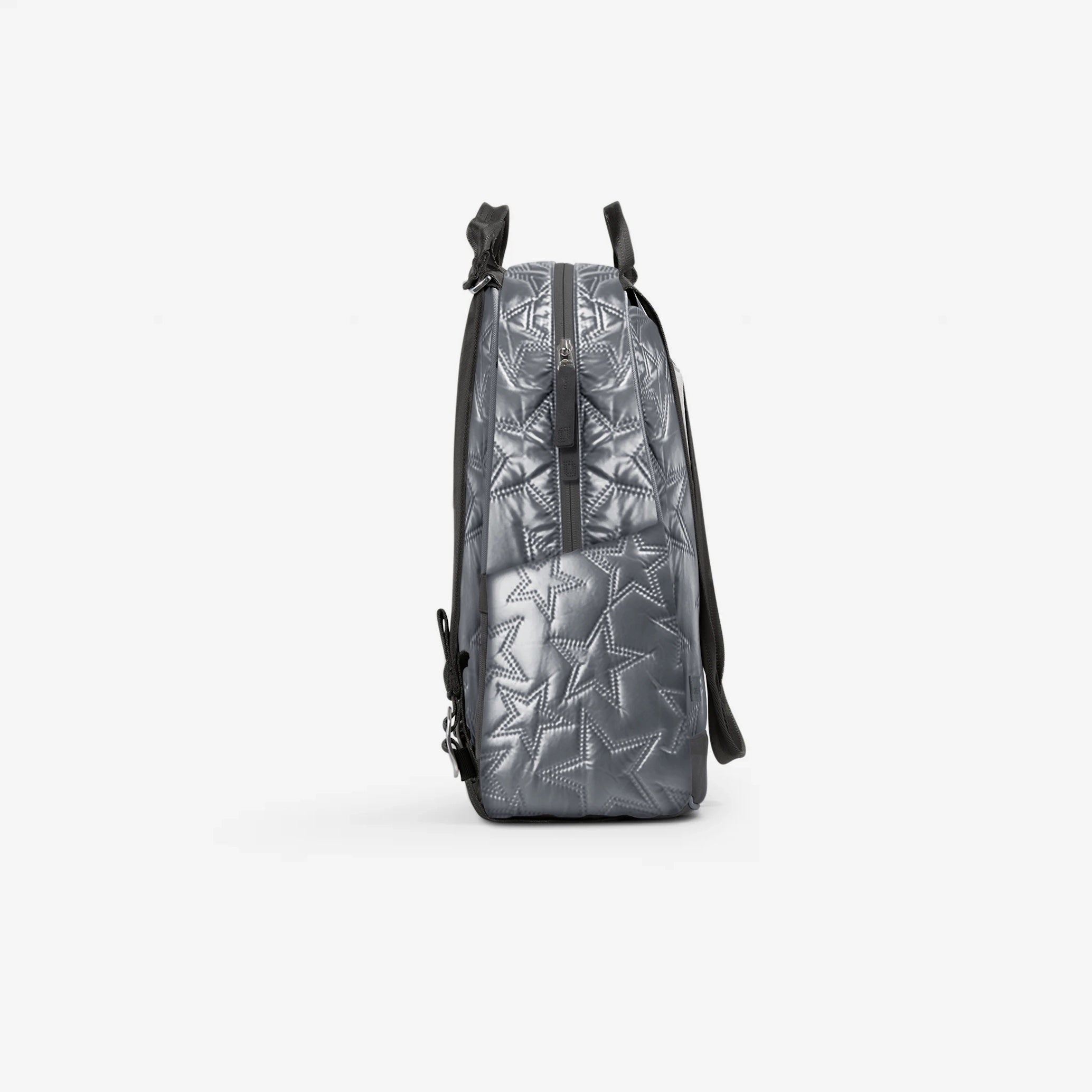 Silver quilted Tennis Backpack & Tote by Doubletake, featuring an all-over star pattern, shown in a side view.
