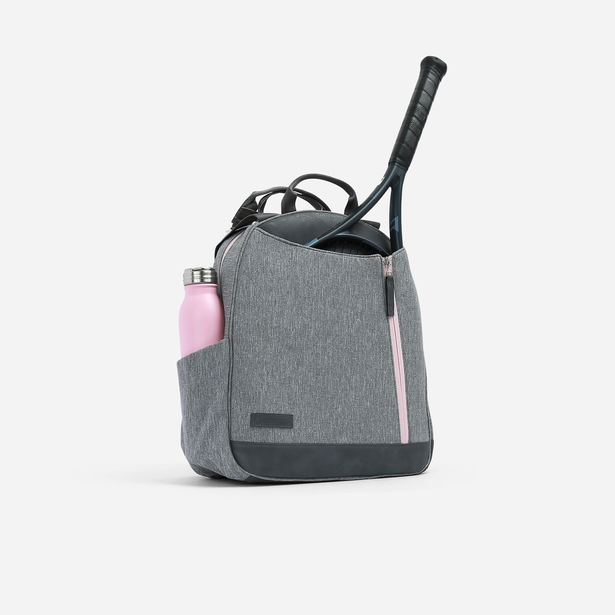 Grey heathered tennis backpack and tote by Doubletake with pink zippers, holding a tennis racket and pink water bottle.