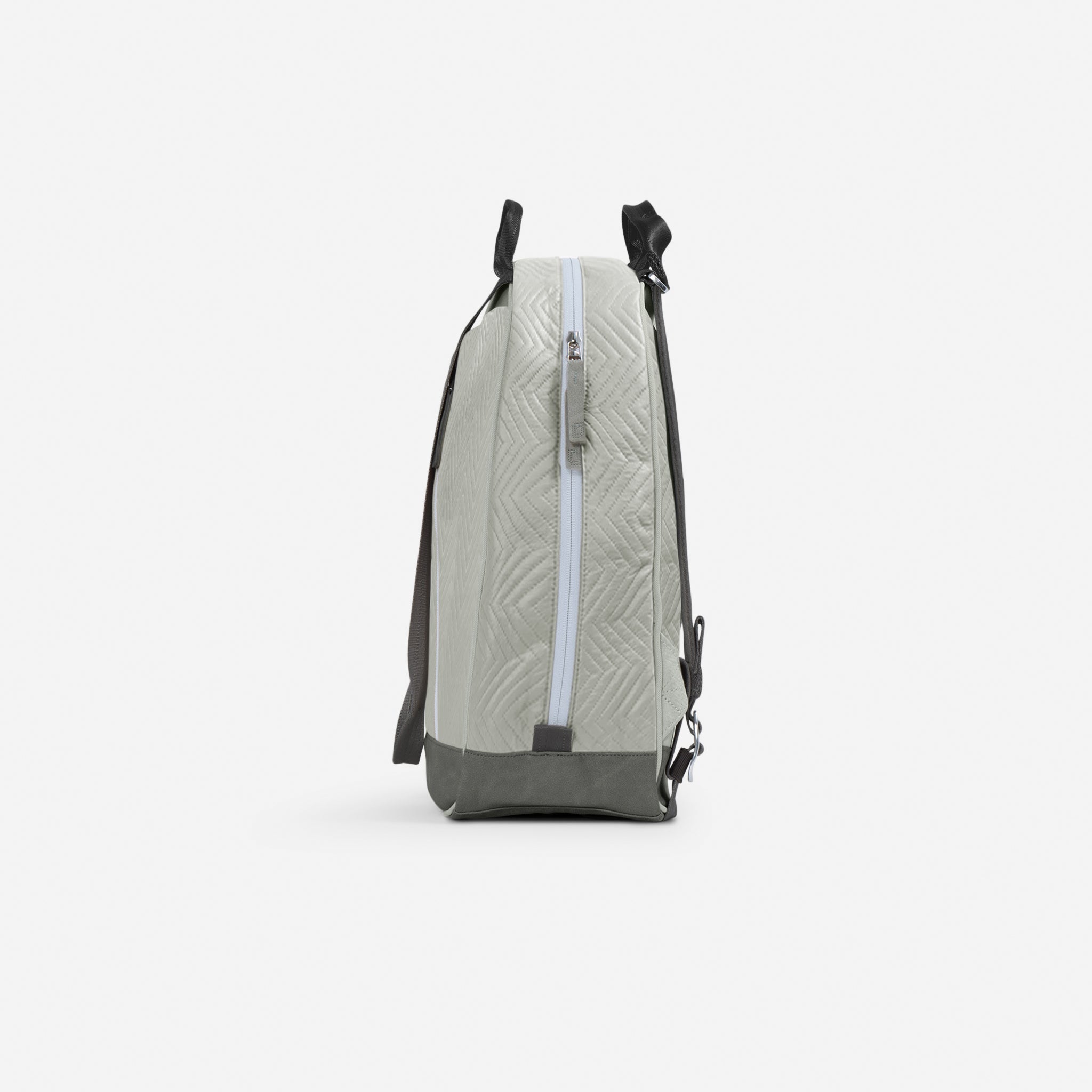 Two-tone Pickleball Backpack & Tote by Doubletake, with light gray zigzag texture, vertical zipper, and black handles, side view.
