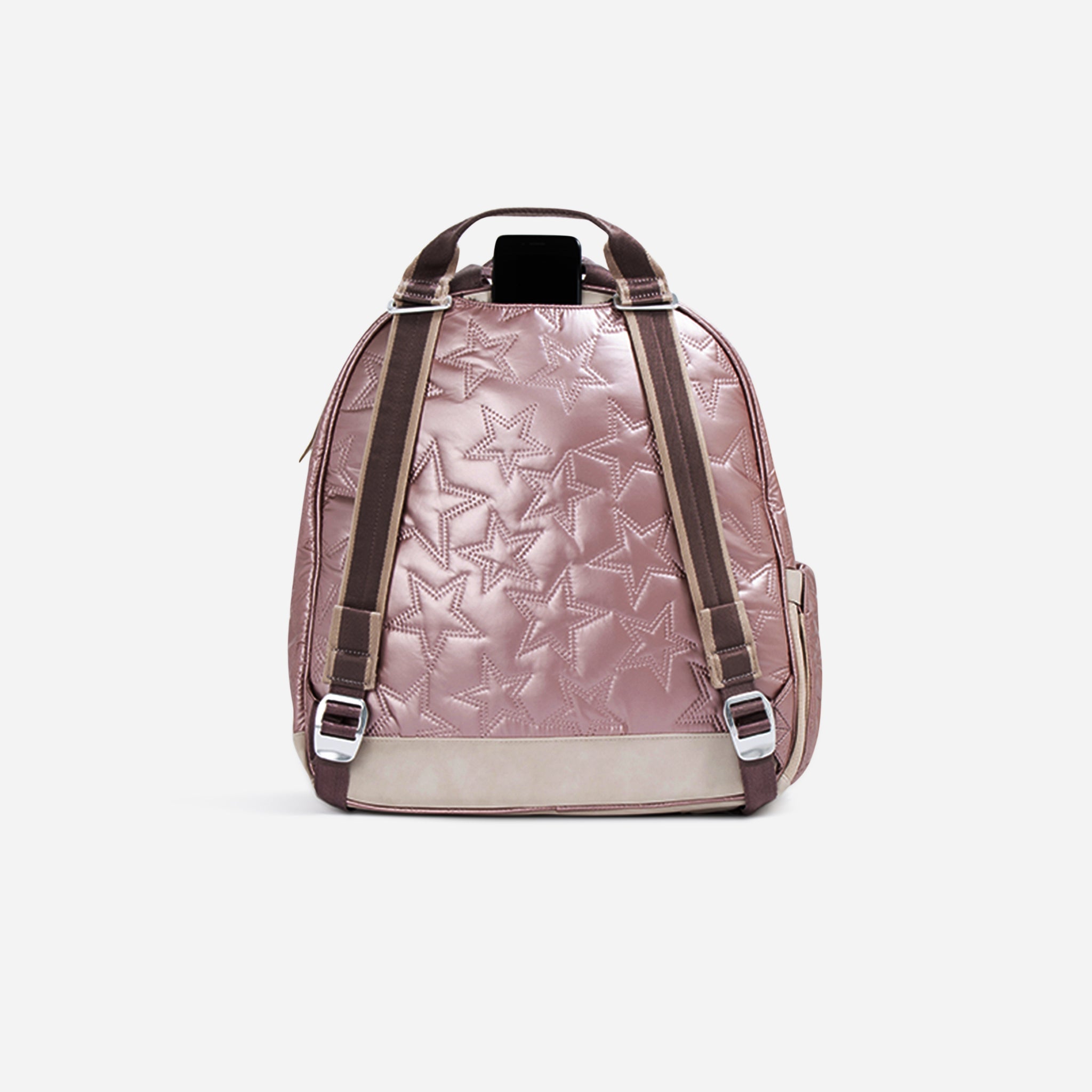 Shiny pink quilted backpack by Doubletake with star pattern, brown straps, beige base, and a smartphone in the top pocket, back view.