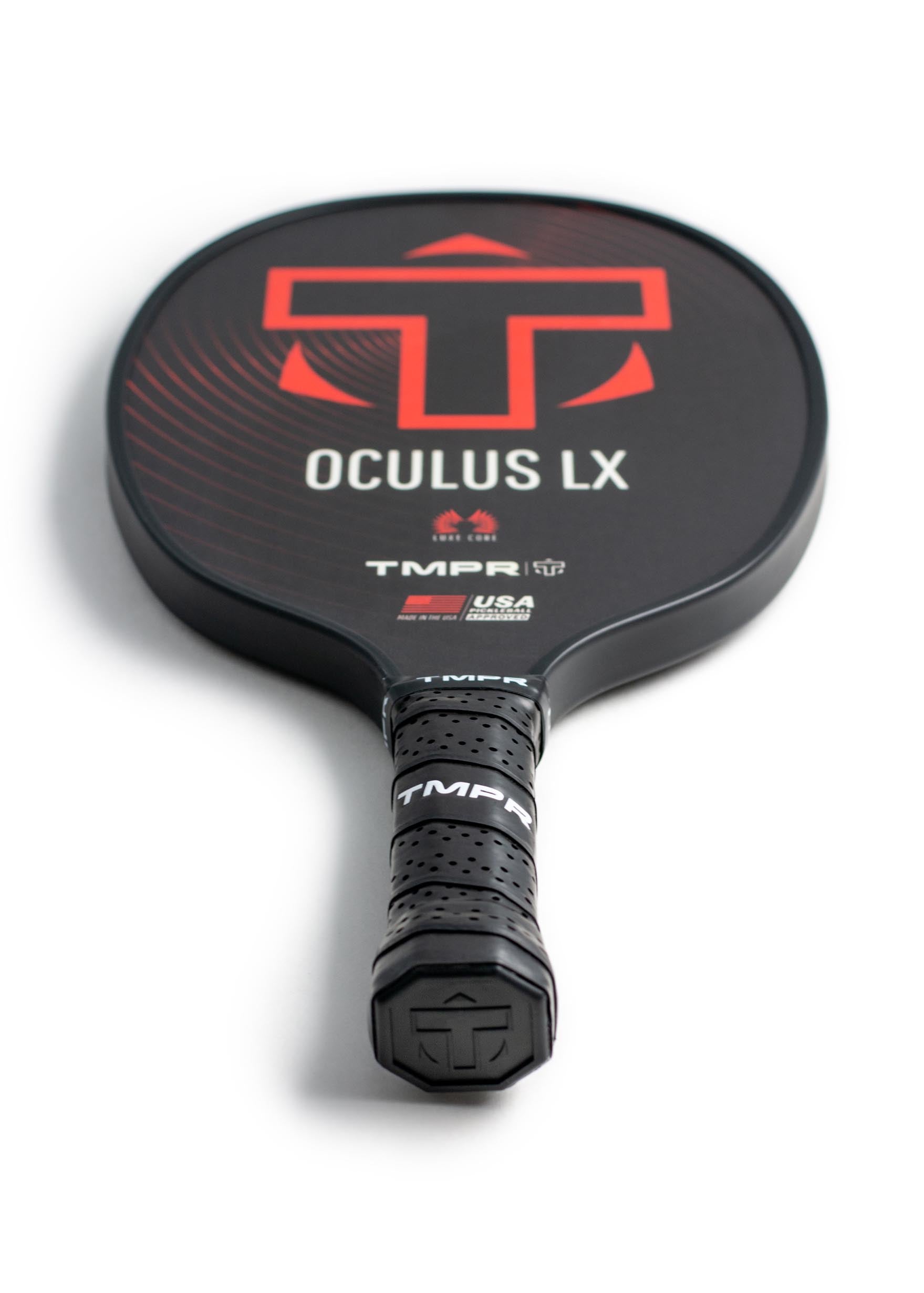 Black Oculus LX pickleball paddle by TMPR Sports with red graphics and a perforated grip, USA Pickleball approved.