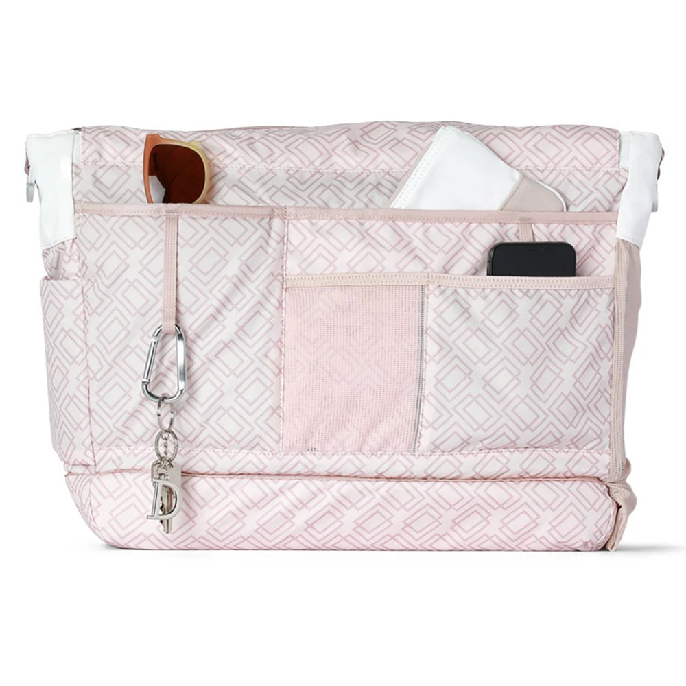 Pink and white patterned Tennis Tote by Doubletake, with multiple pockets holding sunglasses, keys, a phone, and a mask.