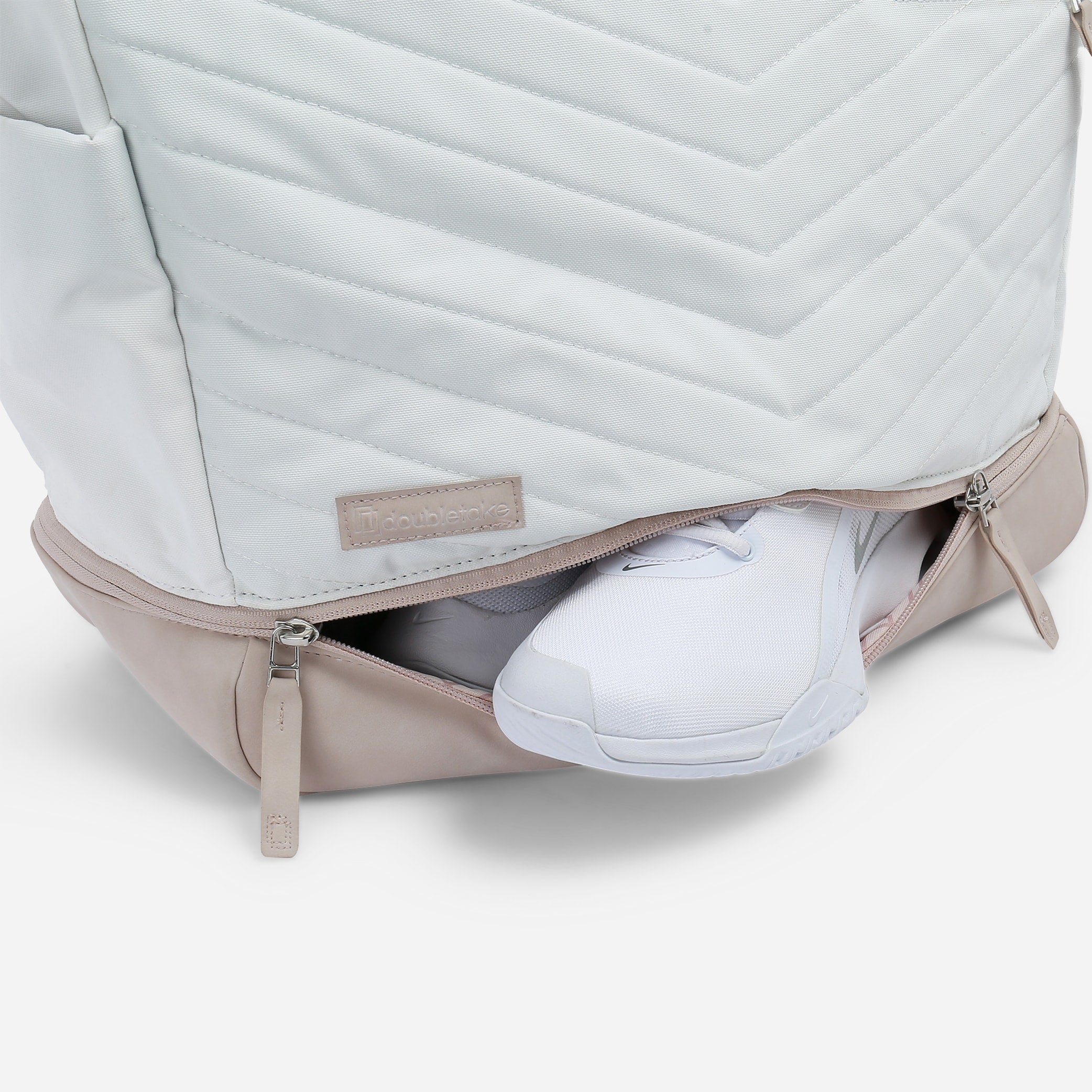 Light blue quilted chevron Pickleball Tote by Doubletake with a beige bottom shoe compartment and white shoe emerging.
